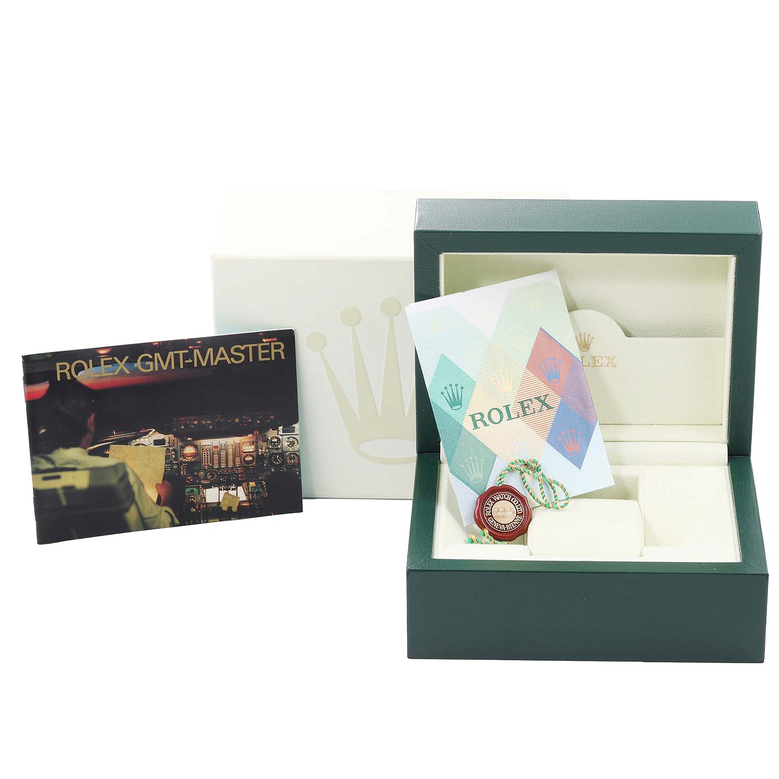 The image shows the packaging, booklet, and warranty card for a Rolex GMT-Master 16710 Men
s Stainless Steel Black Dial 16710 Men
s Stainless Steel Black Dial watch.