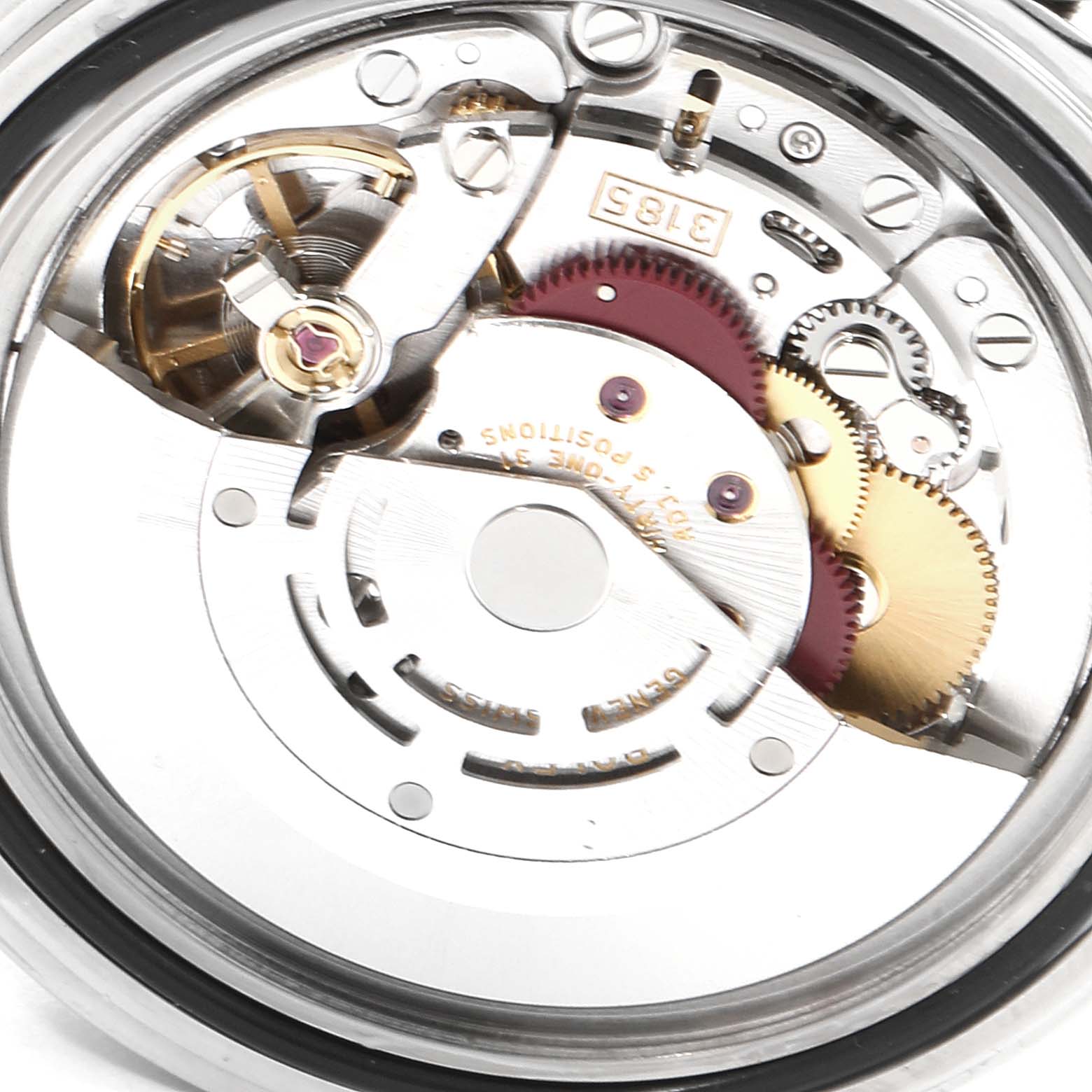 The image shows a close-up of the movement mechanism of a Rolex GMT-Master 16710 Men
s Stainless Steel Black Dial 16710 Men
s Stainless Steel Black Dial watch, revealing gears and intricate internal components.