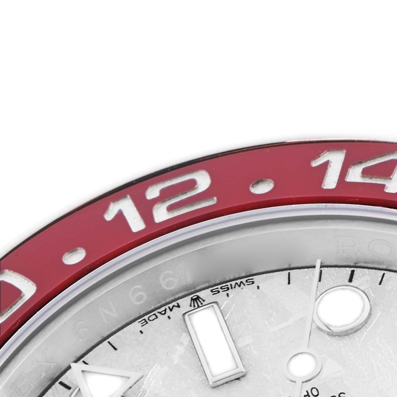The image shows a close-up of the red bezel and part of the dial of a Rolex GMT-Master 126719BLRO Men
s White Gold Silver Dial 126719BLRO Men
s White Gold Silver Dial watch.