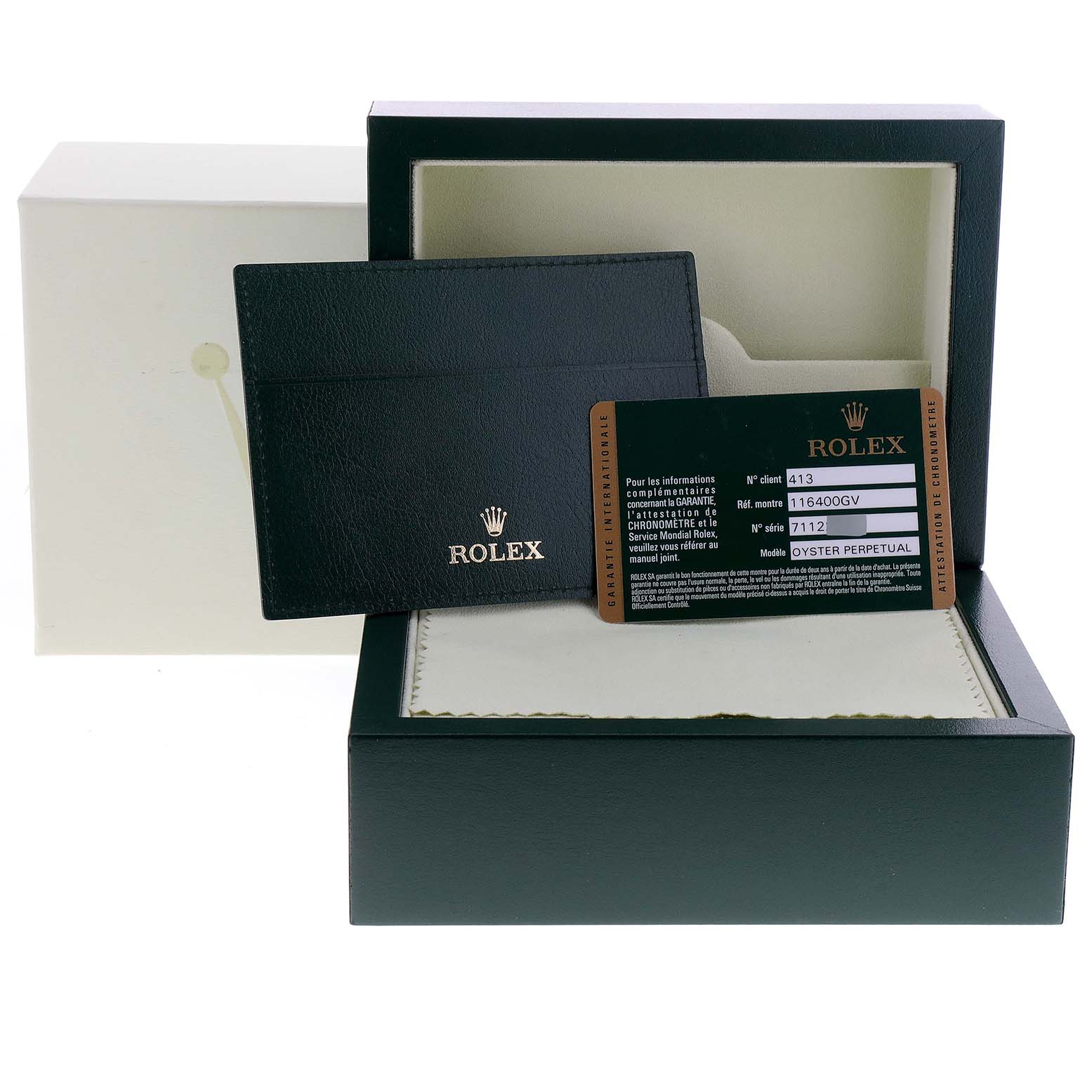 The image shows the packaging, cardholder, and warranty card for the Rolex Milgauss 116400V Men
s Stainless Steel Black Dial 116400V Men
s Stainless Steel Black Dial watch.
