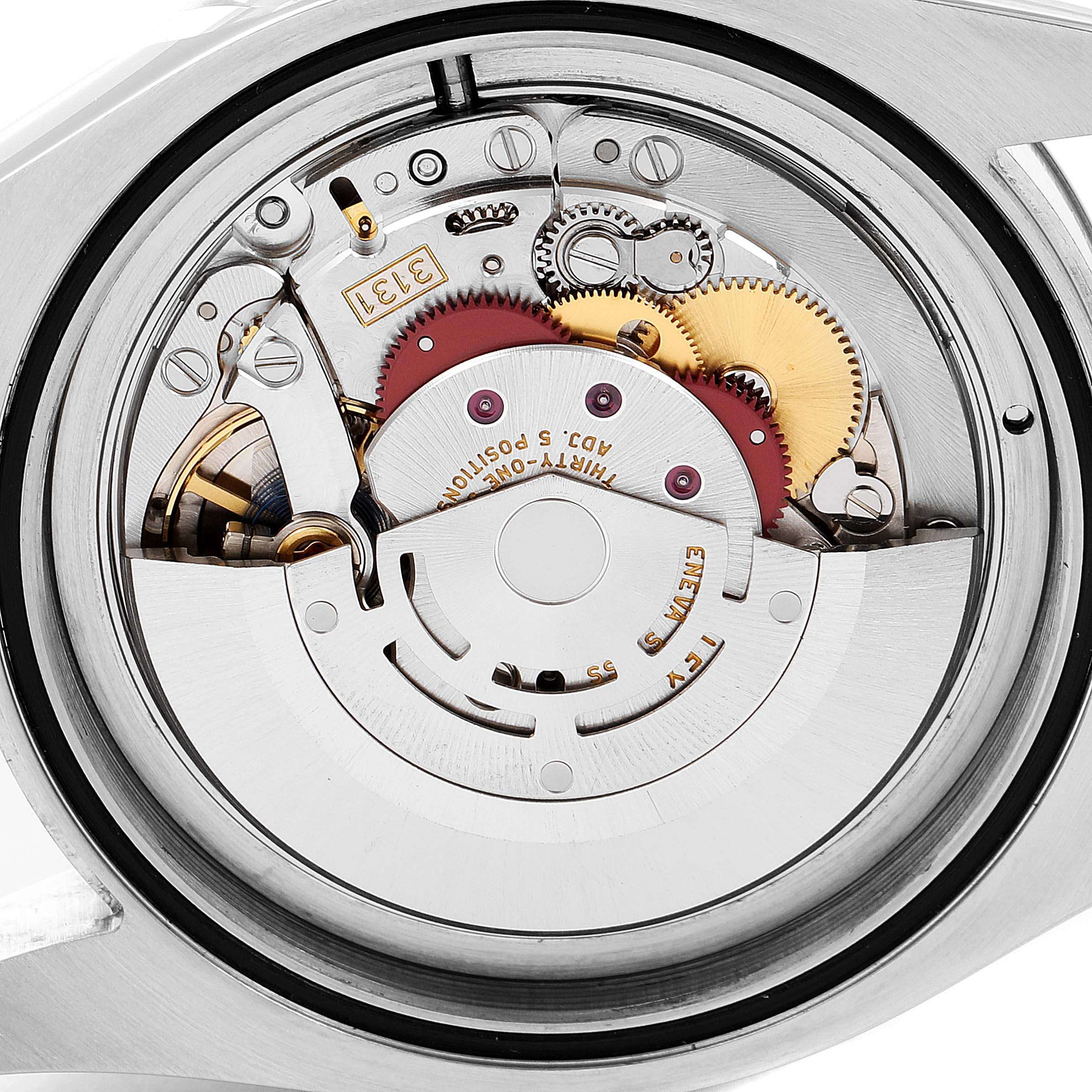 This image shows the movement and internal mechanics of the Rolex Milgauss 116400V Men
s Stainless Steel Black Dial 116400V Men
s Stainless Steel Black Dial watch from an open case back view.