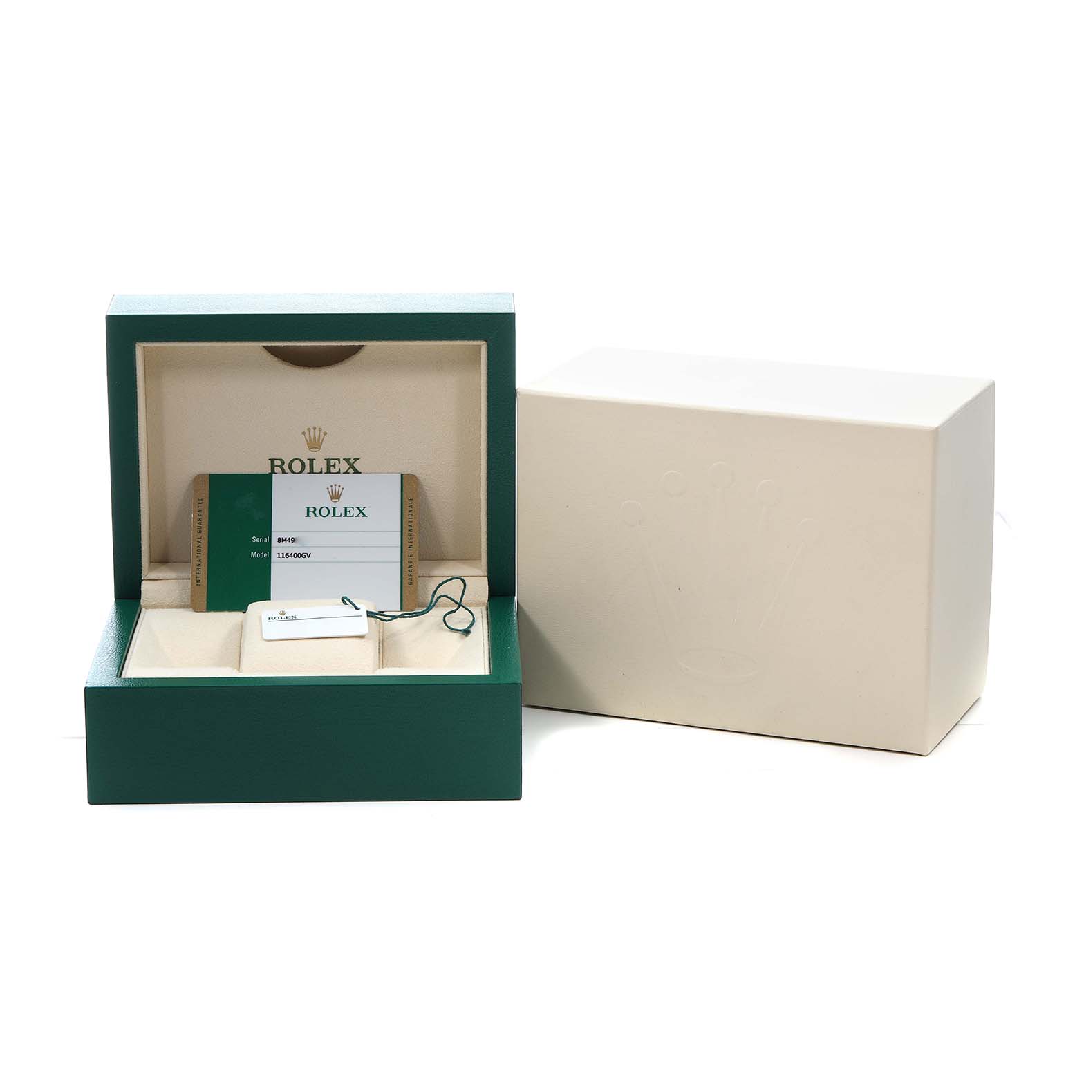 The Rolex Milgauss M116400GV Men's Stainless Steel Blue Dial model's packaging is shown, including the inner and outer boxes, and accompanying cards.
