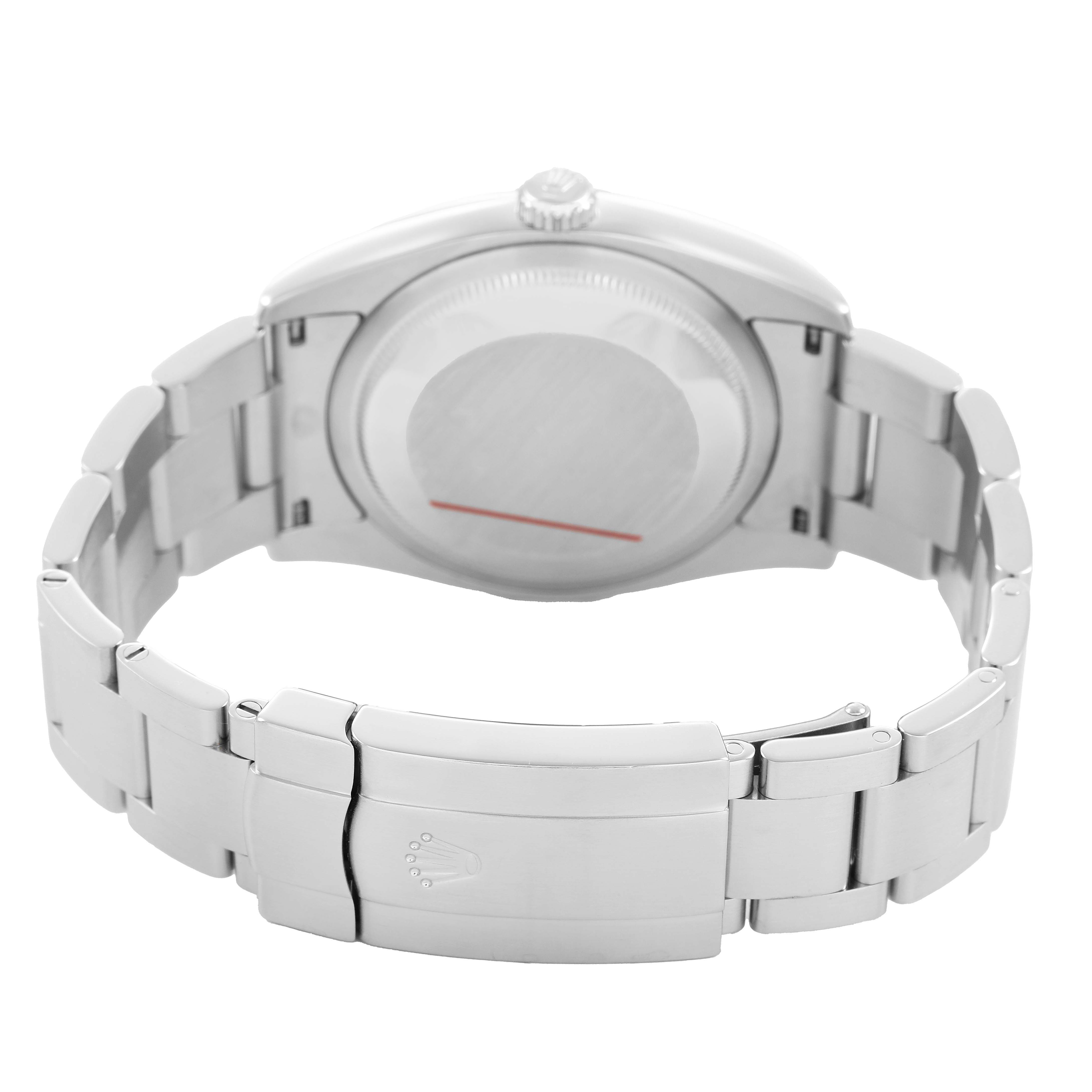 The image shows the back view of a Rolex Oyster Perpetual 116000 Men's Stainless Steel Silver Dial, highlighting the case back and bracelet clasp.