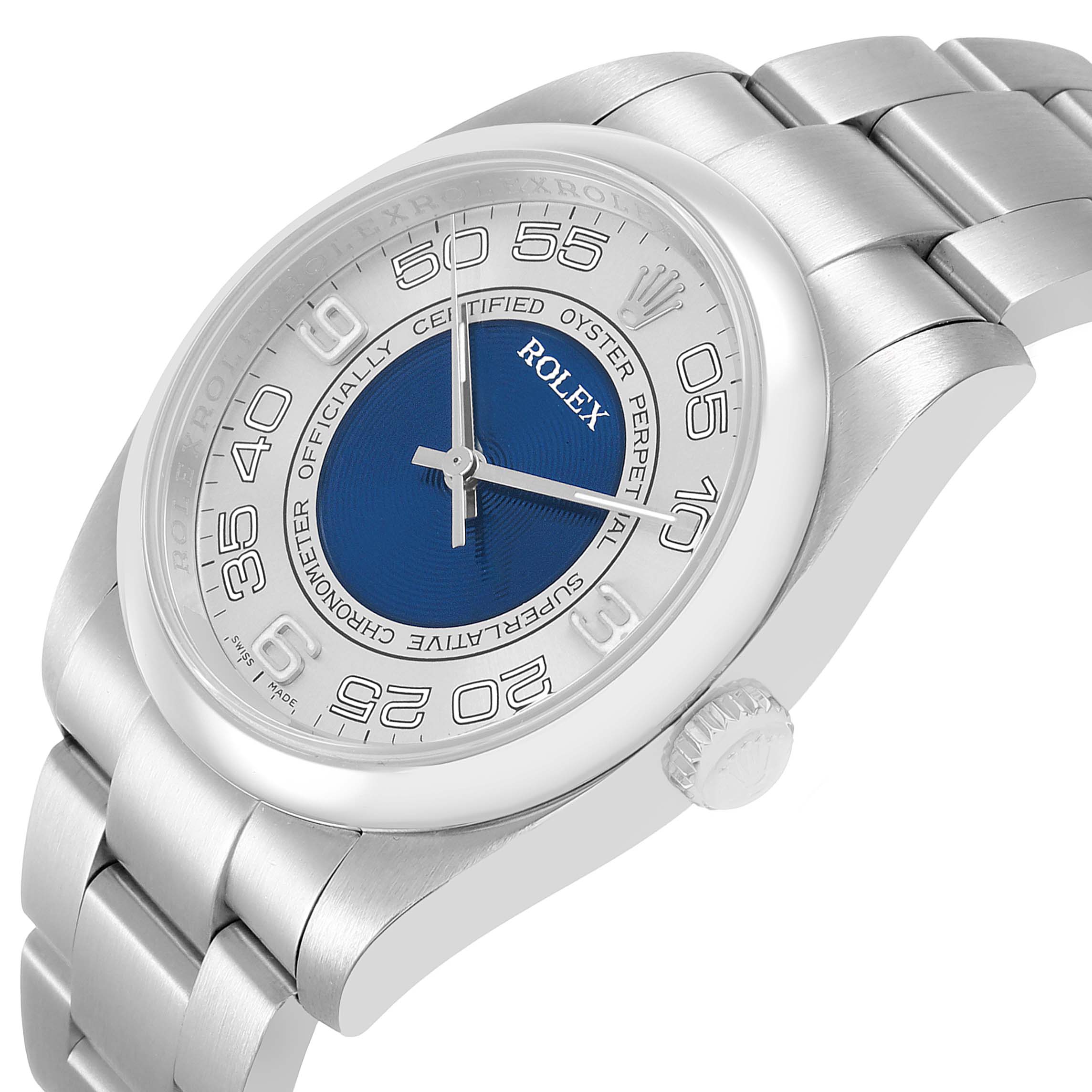The image shows a Rolex Oyster Perpetual 116000 Men's Stainless Steel Silver Dial watch at an angle highlighting the dial, crown, and bracelet.
