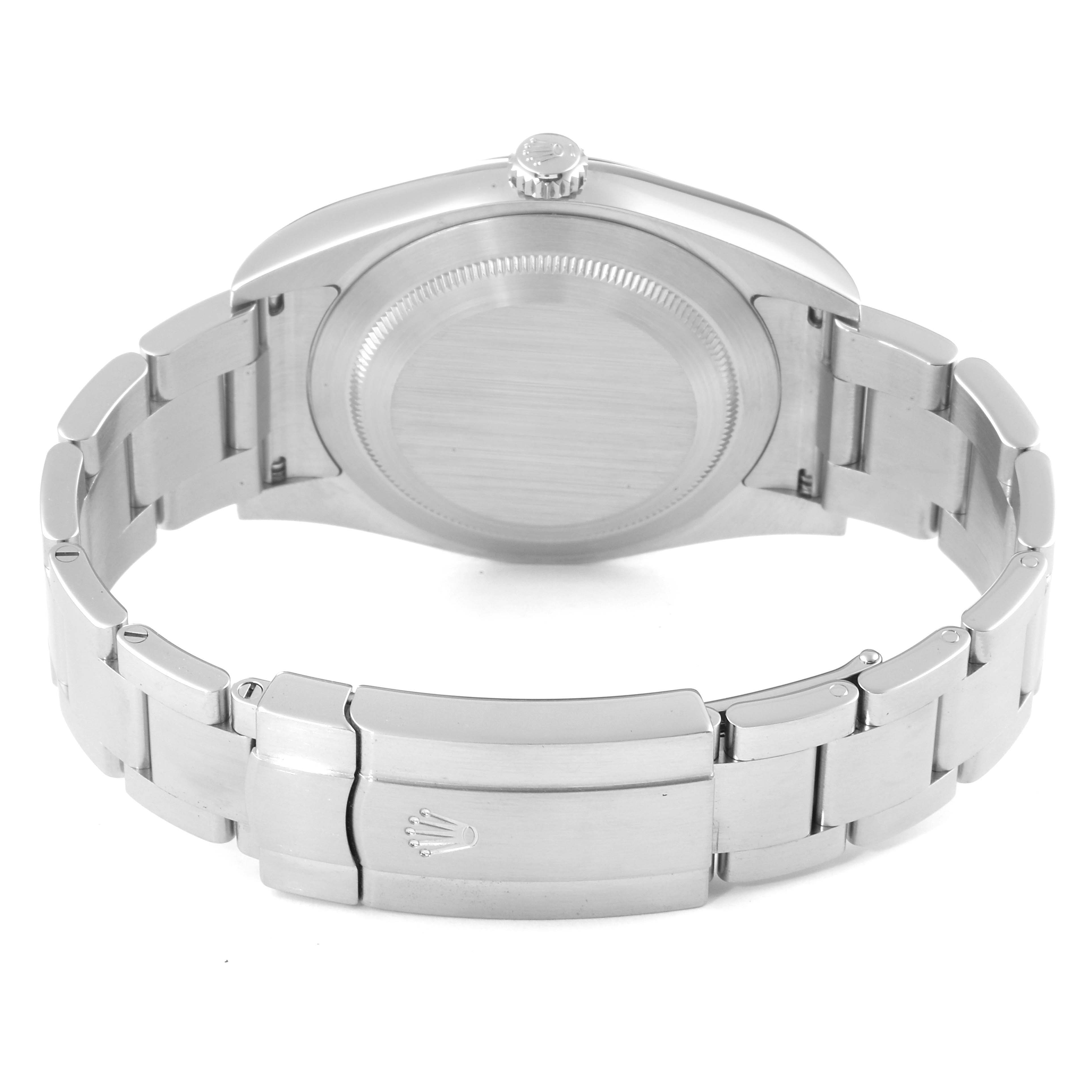 The image shows the back view of a Rolex Oyster Perpetual 114300 Men
s Stainless Steel Blue Dial 114300 Men
s Stainless Steel Blue Dial watch, highlighting the case back, bracelet, and clasp.