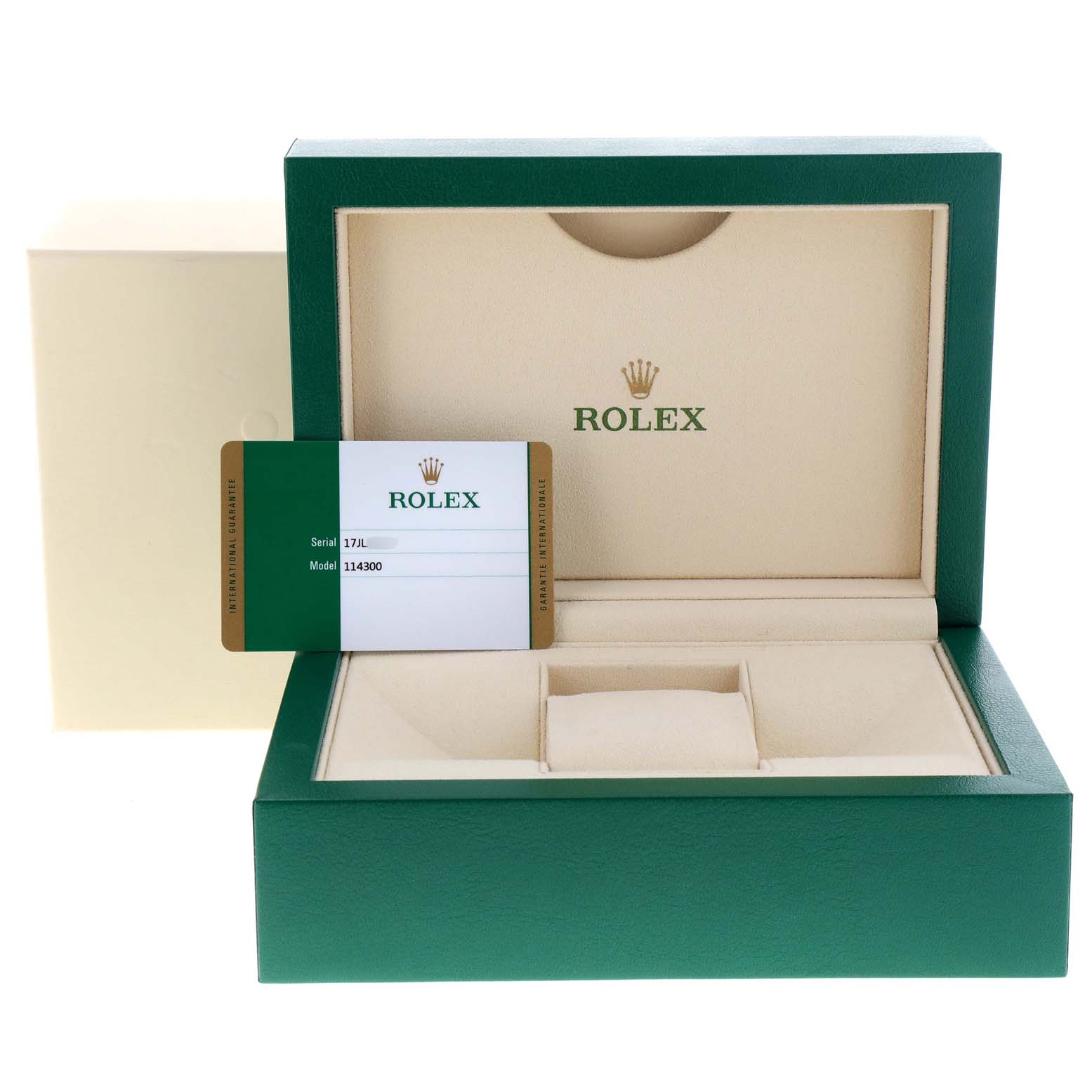 The image shows the open box and Best Quality
ity card of a Rolex Oyster Perpetual 114300 Men
s Stainless Steel Blue Dial 114300 Men
s Stainless Steel Blue Dial model 114300.
