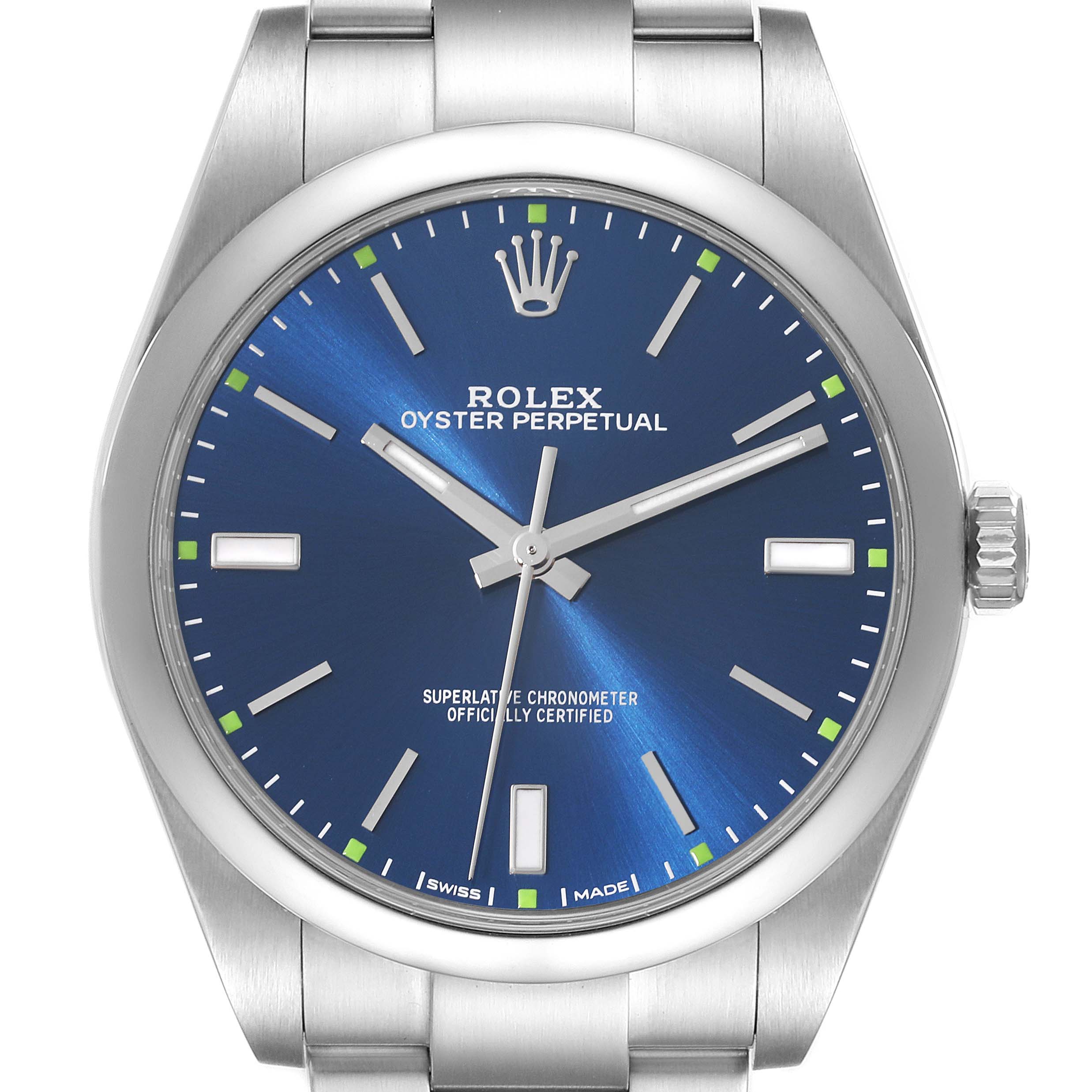 The image shows a frontal view of a Rolex Oyster Perpetual 114300 Men
s Stainless Steel Blue Dial 114300 Men
s Stainless Steel Blue Dial watch with a blue dial and silver band.