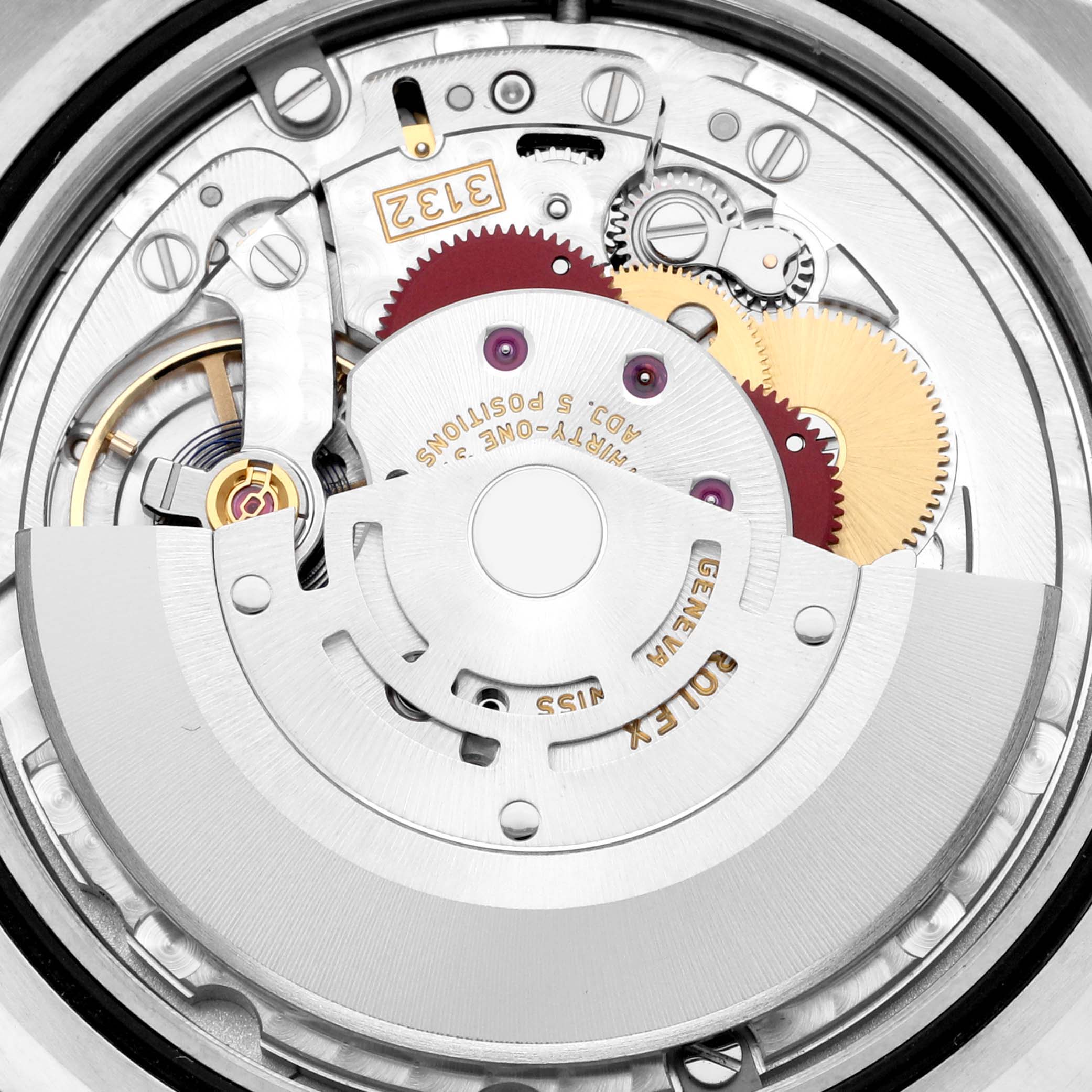 This image shows a close-up view of the inner mechanism of a Rolex Oyster Perpetual 114300 Men
s Stainless Steel Blue Dial 114300 Men
s Stainless Steel Blue Dial watch, highlighting its intricate gears and components.