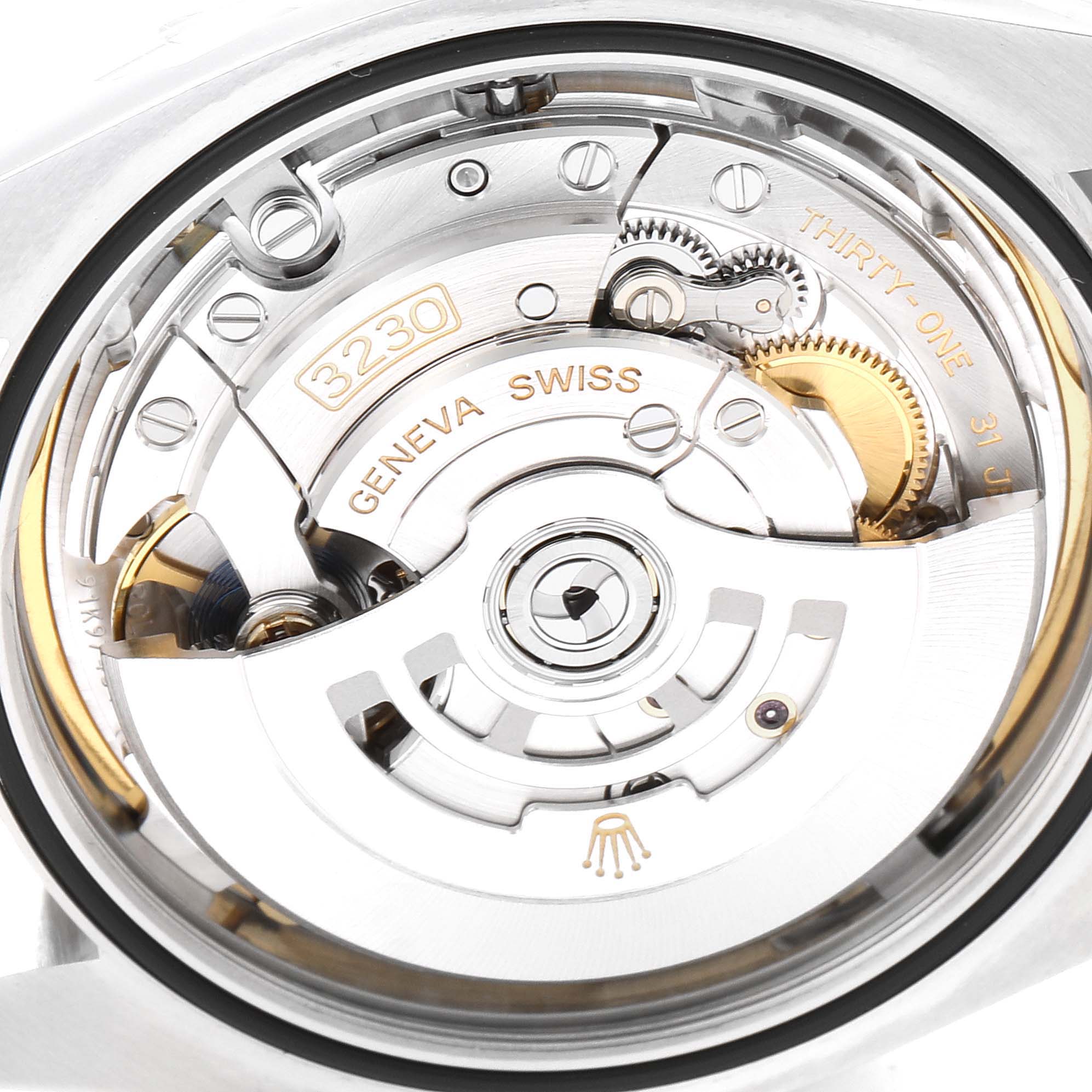 The image shows a close-up of the movement mechanism in a Rolex Oyster Perpetual 124300 Men
s Stainless Steel Blue Dial 124300 Men
s Stainless Steel Blue Dial watch, emphasizing its intricate internal components.