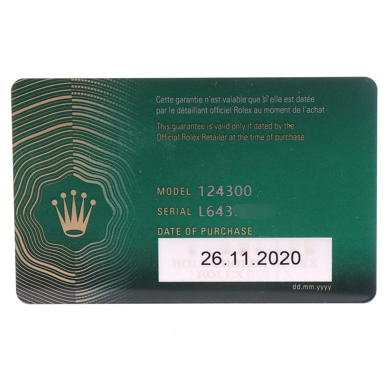 The image shows a warranty card for the Rolex Oyster Perpetual 124300 Men
s Stainless Steel Blue Dial 124300 Men
s Stainless Steel Blue Dial model 124300, including model number, serial number, and purchase date.