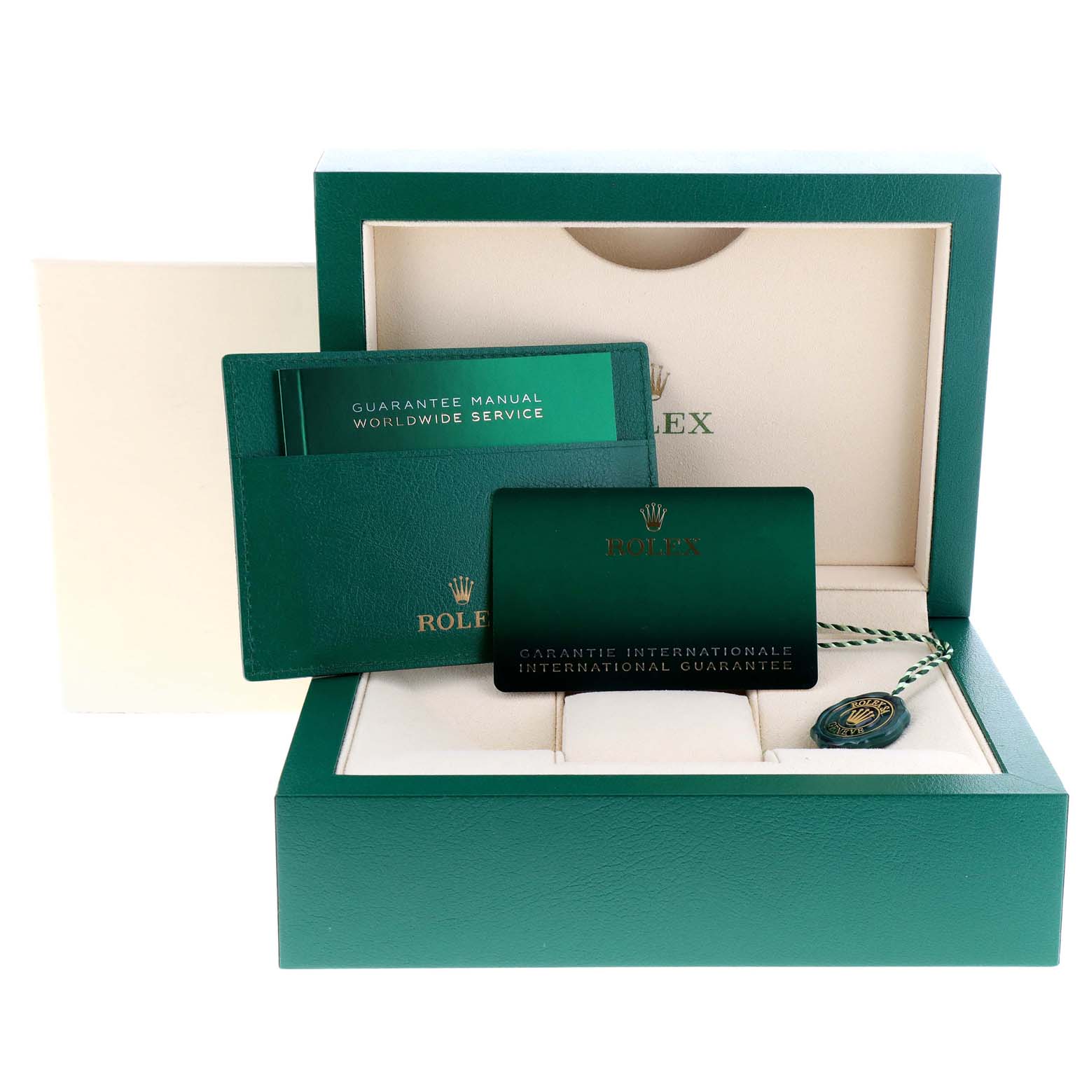 This image shows the warranty card, manual, and box for a Rolex Oyster Perpetual 124300 Men
s Stainless Steel Blue Dial 124300 Men
s Stainless Steel Blue Dial watch.