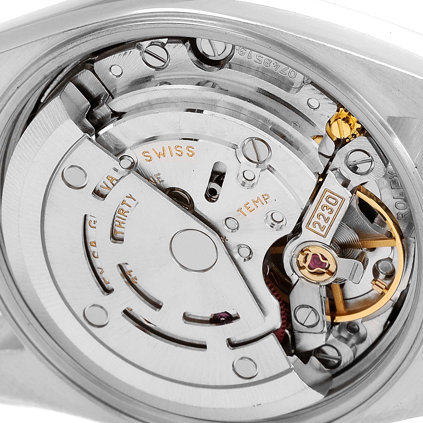 This image shows a close-up view of the movement and internal mechanics of a Rolex Oyster Perpetual 76030 Women
s Stainless Steel Silver Dial 76030 Women
s Stainless Steel Silver Dial watch.