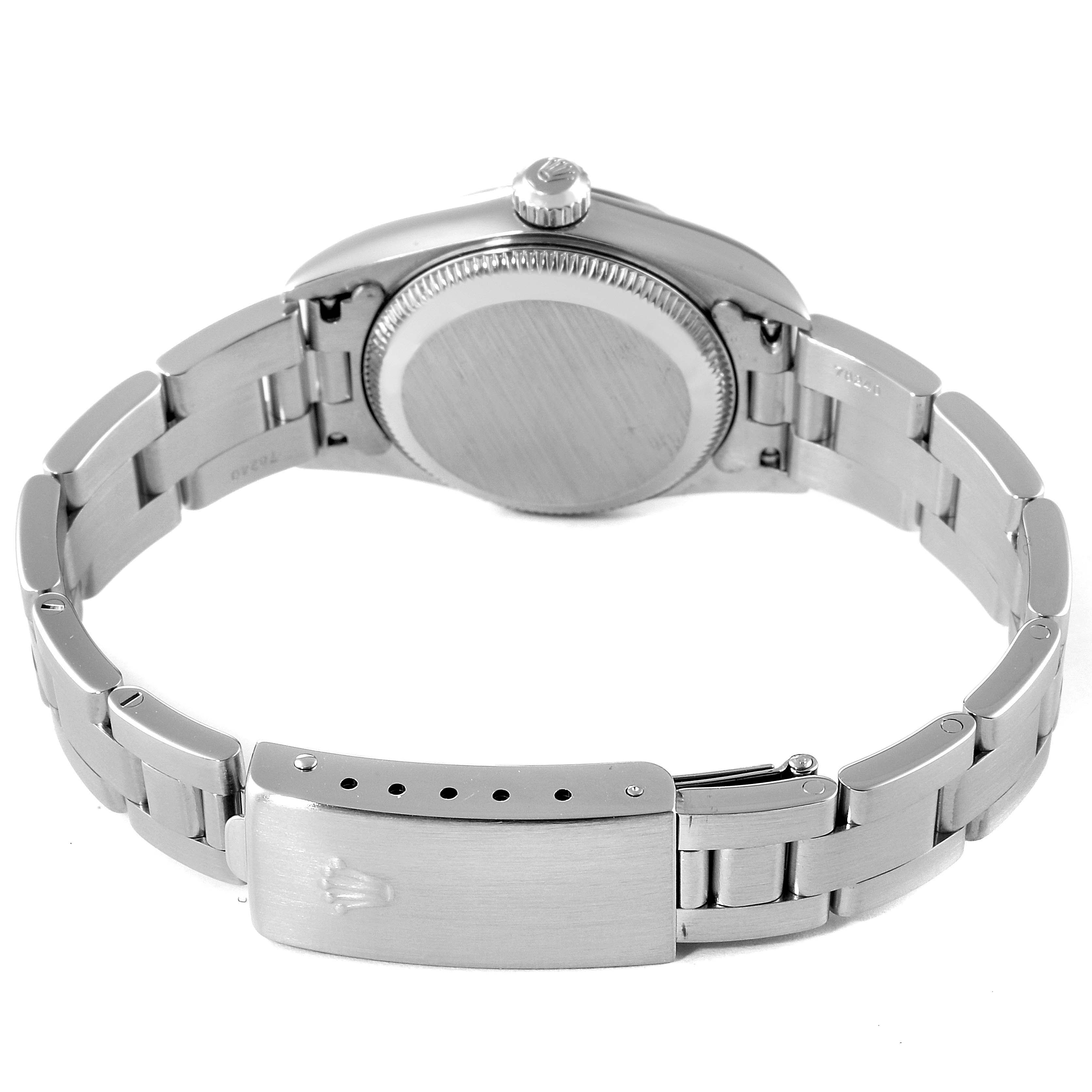 This image shows the backside and clasp of a Rolex Oyster Perpetual 76030 Women
s Stainless Steel Silver Dial 76030 Women
s Stainless Steel Silver Dial watch, highlighting the bracelet and casing.
