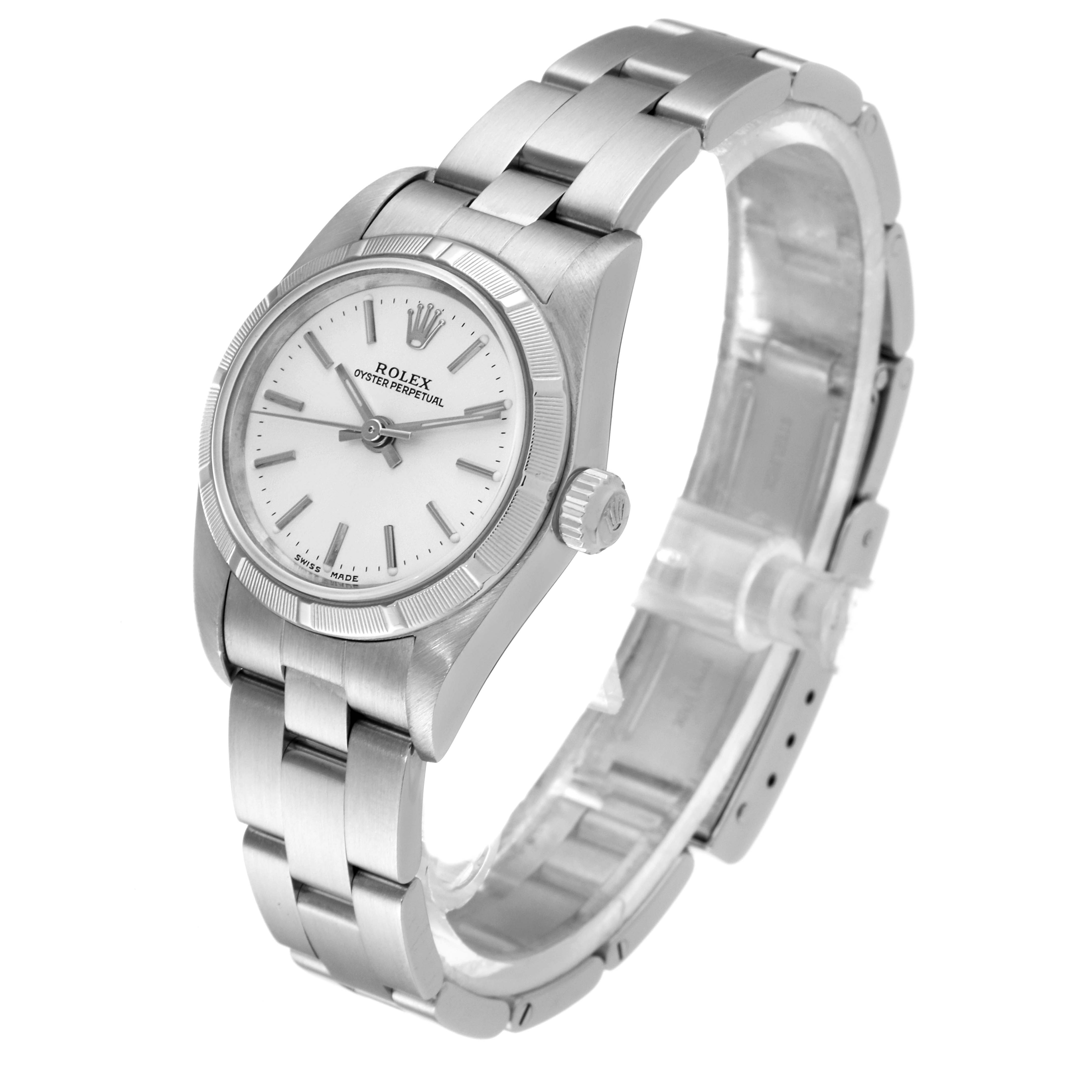 The image shows a Rolex Oyster Perpetual 76030 Women
s Stainless Steel Silver Dial 76030 Women
s Stainless Steel Silver Dial watch from an angled perspective, highlighting the dial, bezel, case, crown, and bracelet.