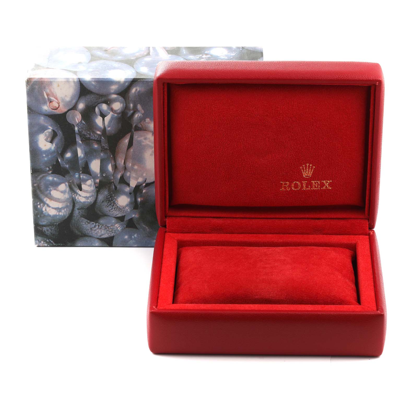 The image shows an open, red Rolex watch box for the President model, with a cushion and the Rolex logo inside.
