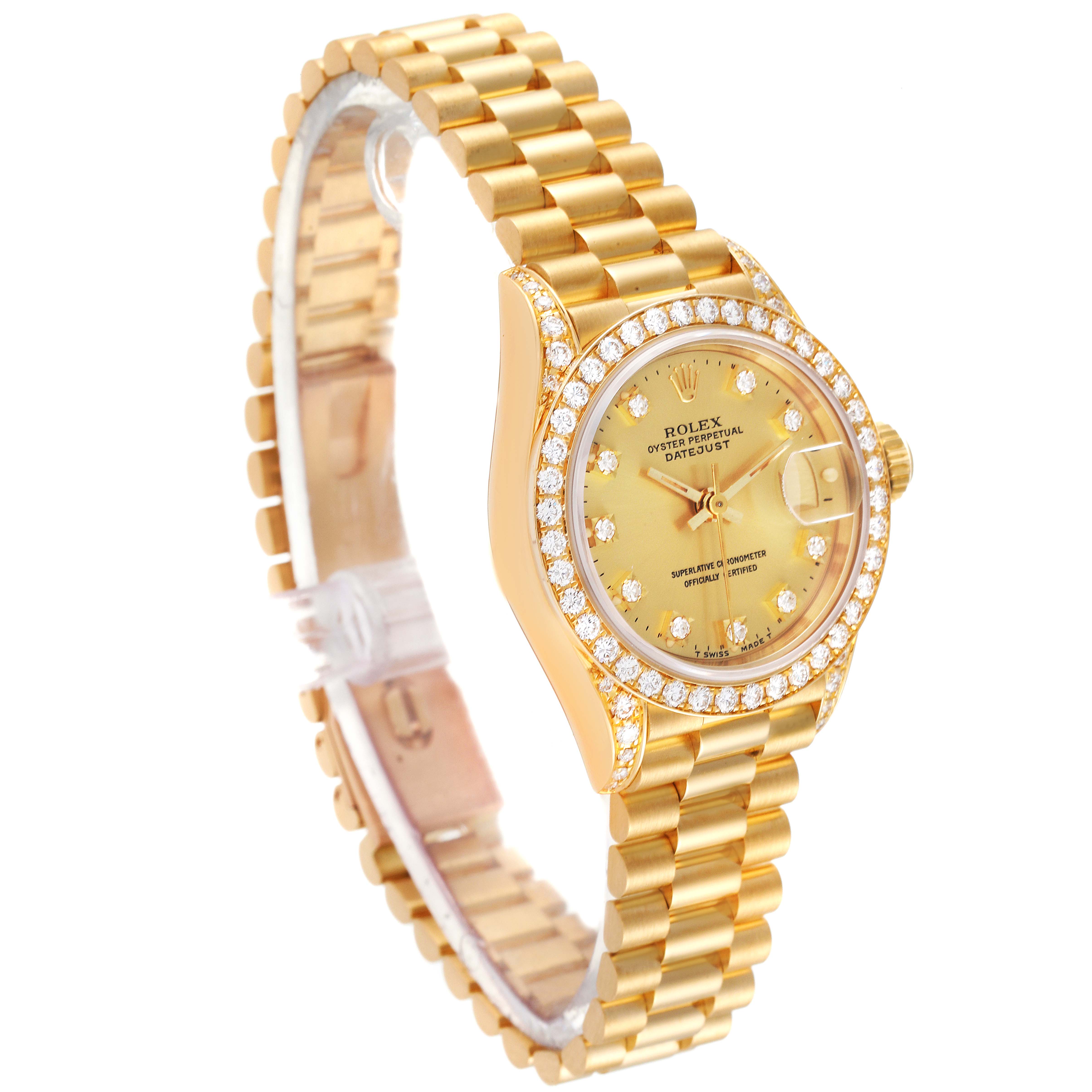 The Rolex President 69158 Women
s Yellow Gold Champagne Dial 69158 Women
s Yellow Gold Champagne Dial watch is shown at a slight angle revealing the gold bracelet, diamond bezel, and dial details.