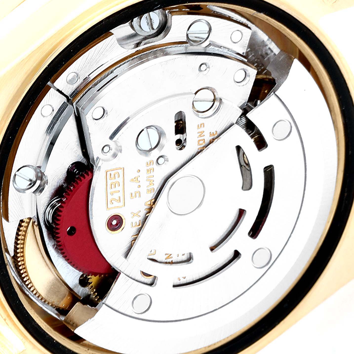 This close-up image shows the movement mechanisms of a Rolex President 69158 Women
s Yellow Gold Champagne Dial 69158 Women
s Yellow Gold Champagne Dial model watch.