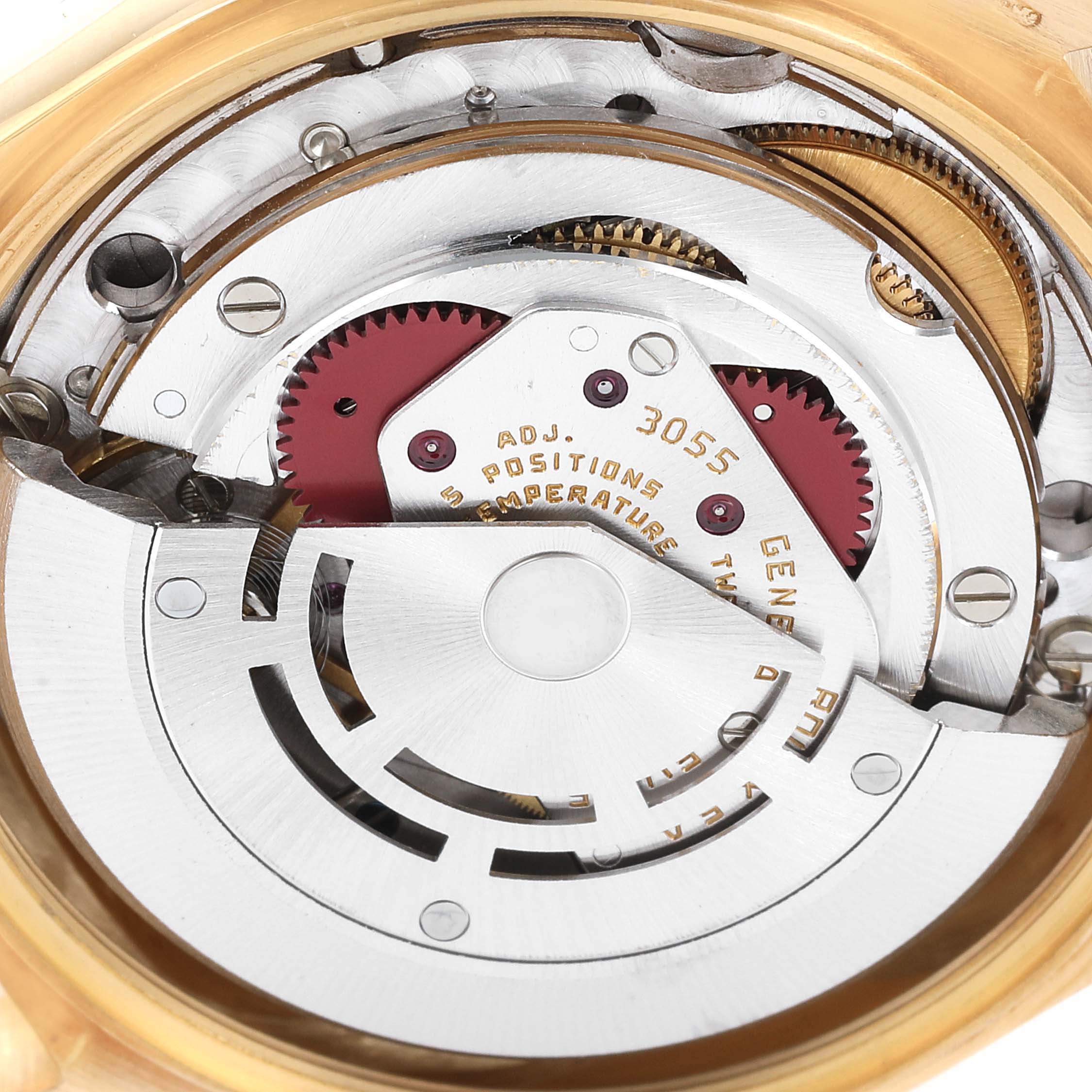 This close-up shot of the Rolex President 18038 Men's Yellow Gold Silver Dial 18038 Men's Yellow Gold Silver Dial model watch shows the intricate details of its internal mechanics.