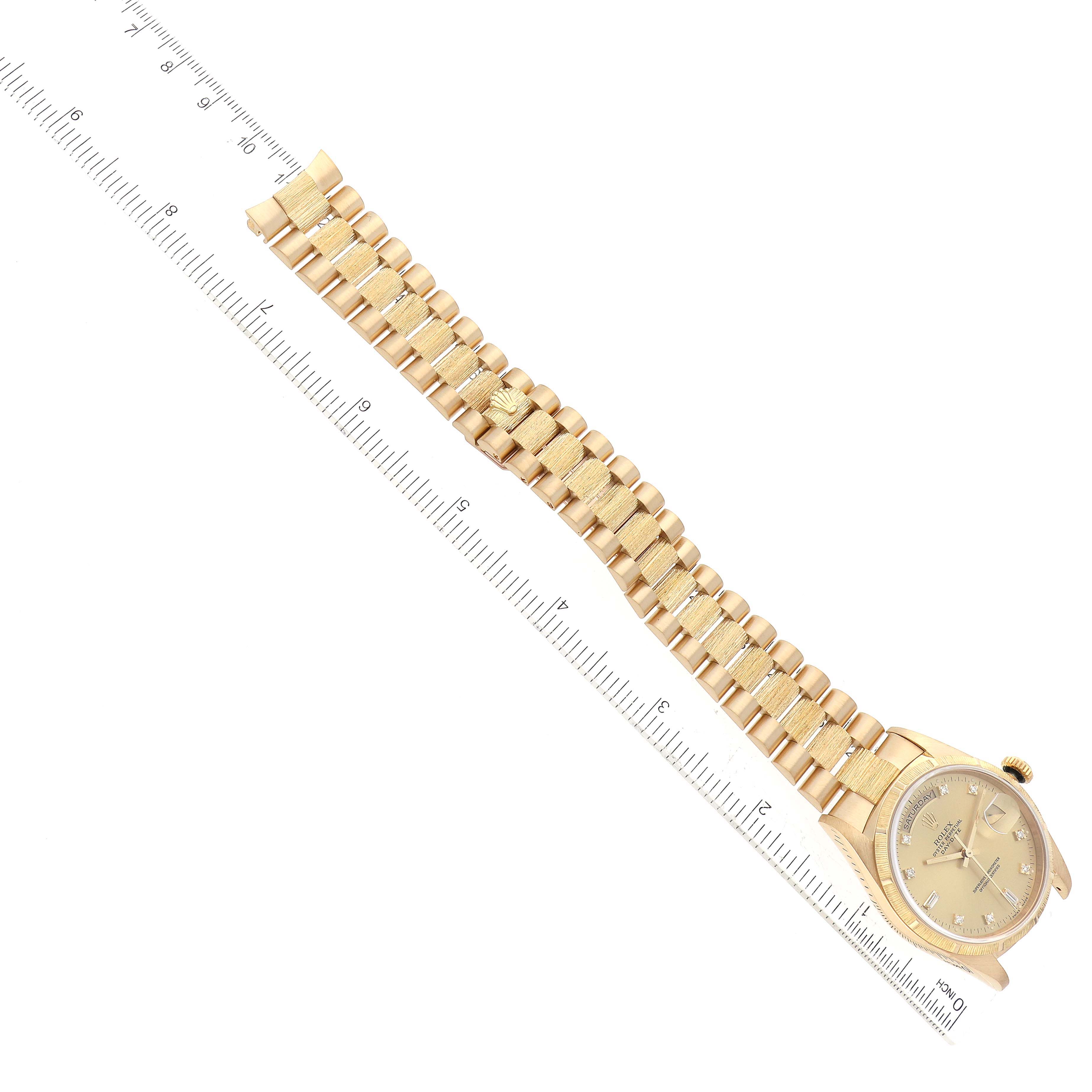 The image shows a Rolex President 18248 Men
s Yellow Gold Champagne Dial 18248 Men
s Yellow Gold Champagne Dial model watch angled diagonally, displaying the face, case, and full bracelet with a measuring ruler.
