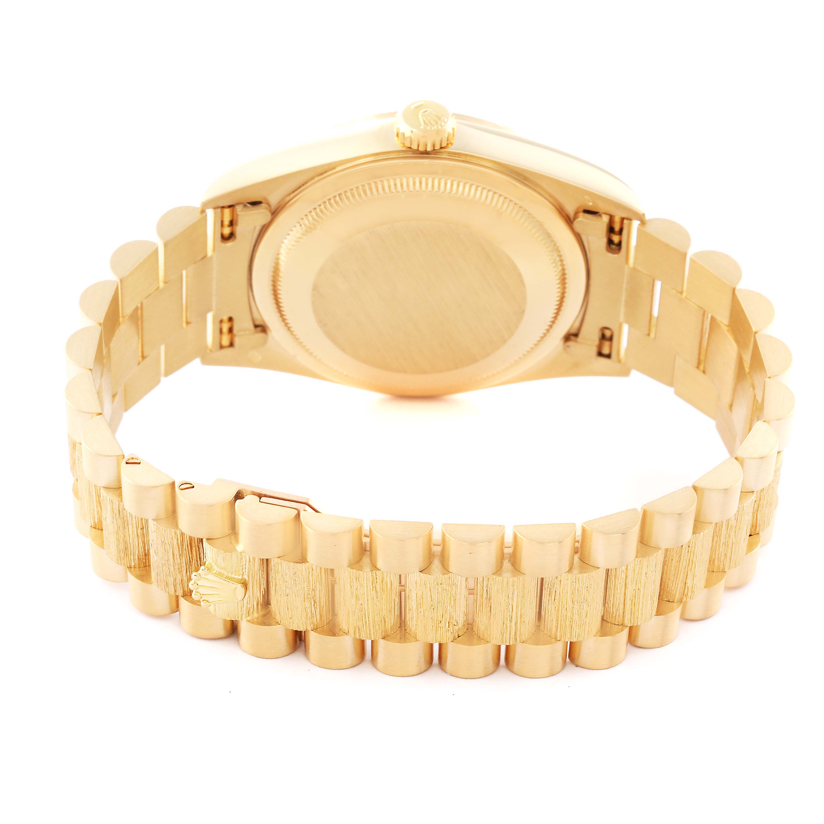 The image shows the back of the case and bracelet of a Rolex President 18248 Men
s Yellow Gold Champagne Dial 18248 Men
s Yellow Gold Champagne Dial model watch.