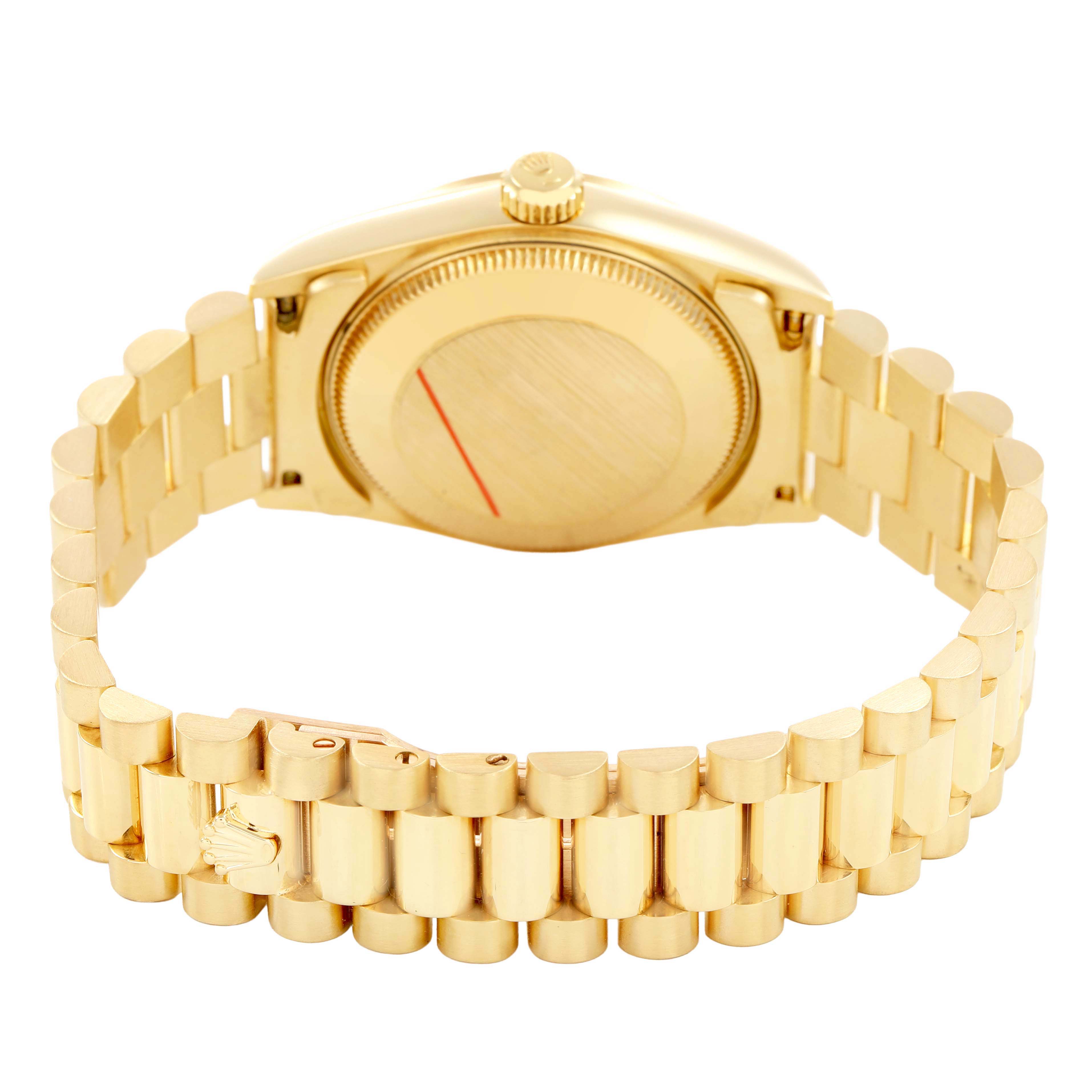The image shows the back case and bracelet of a Rolex Datejust 68238 Women's Yellow Gold Champagne Dial watch, focusing on the case back and clasp.