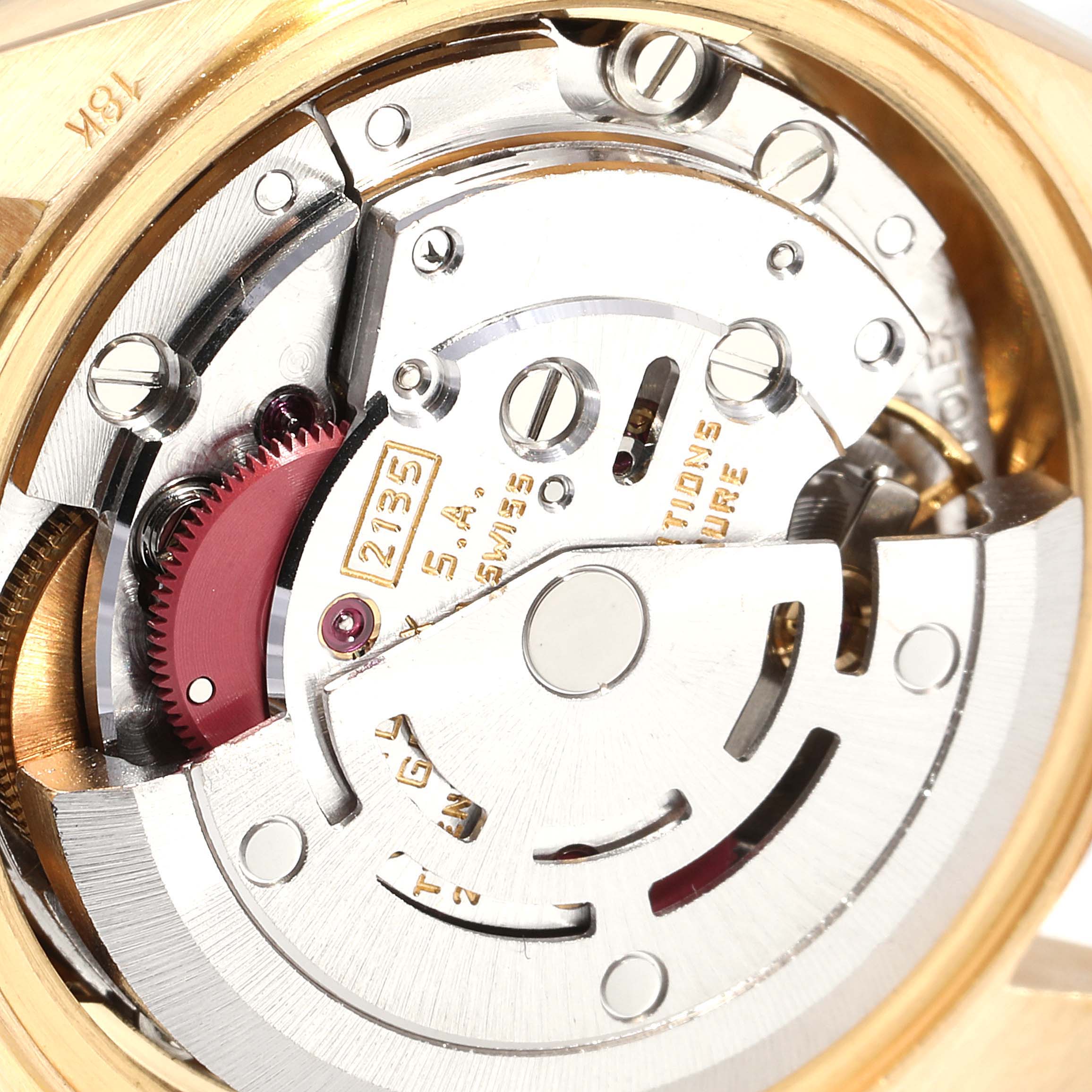 This image shows a detailed view of the movement mechanism inside a Rolex Pearlmaster 69258 Women's Yellow Gold Champagne Dial 69258 Women's Yellow Gold Champagne Dial watch.
