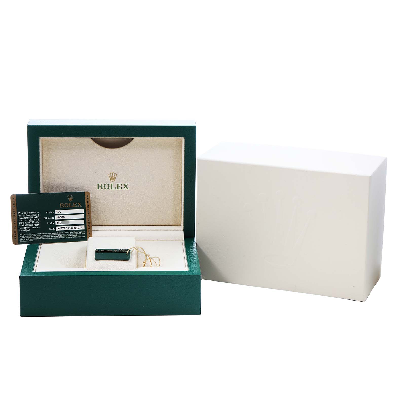 The image shows a Rolex Sea-Dweller 16600 Men's Stainless Steel Black Dial box with a warranty card and accessories inside.