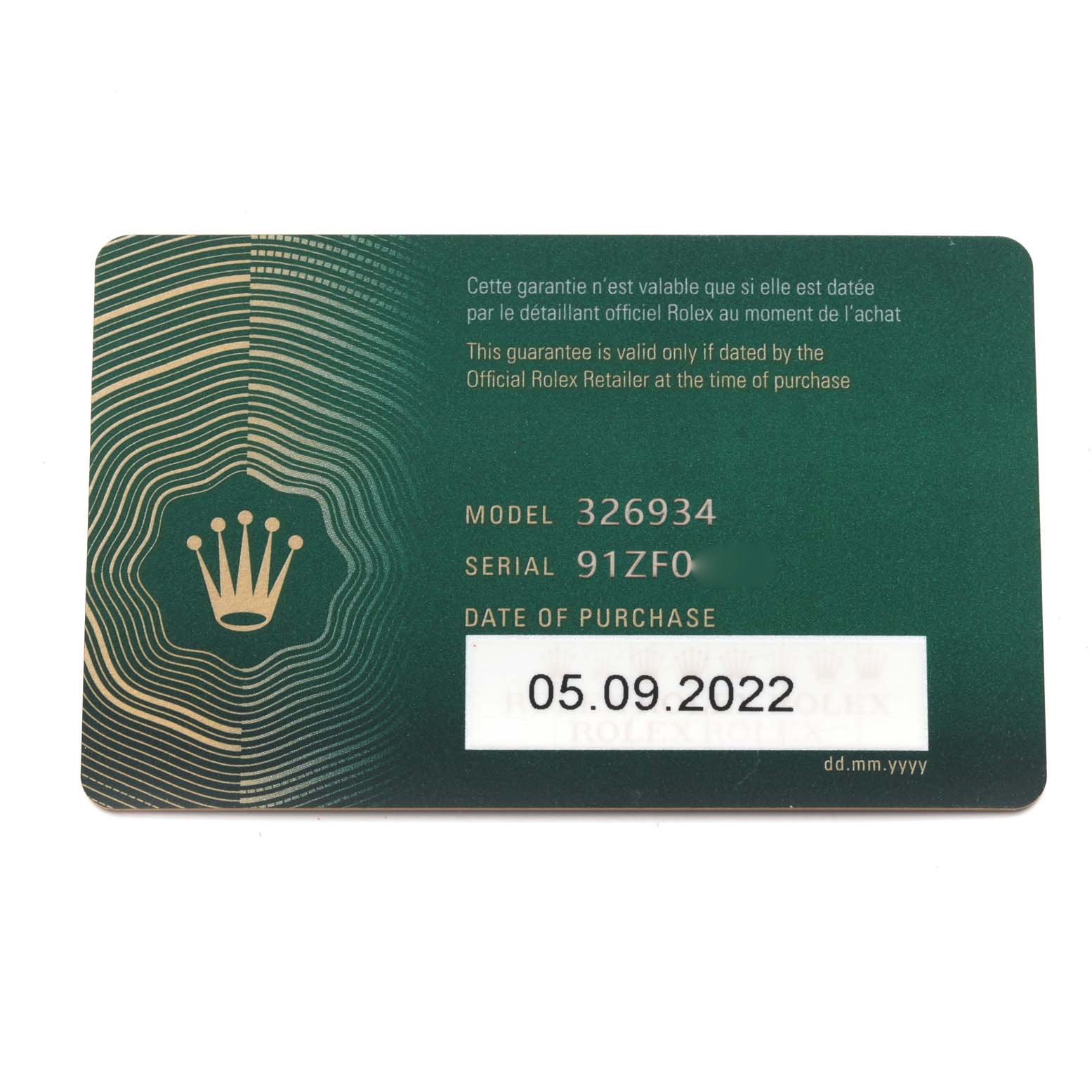 This is a Rolex guarantee card for the Sky-Dweller model, showing the model number, serial number, and date of purchase.