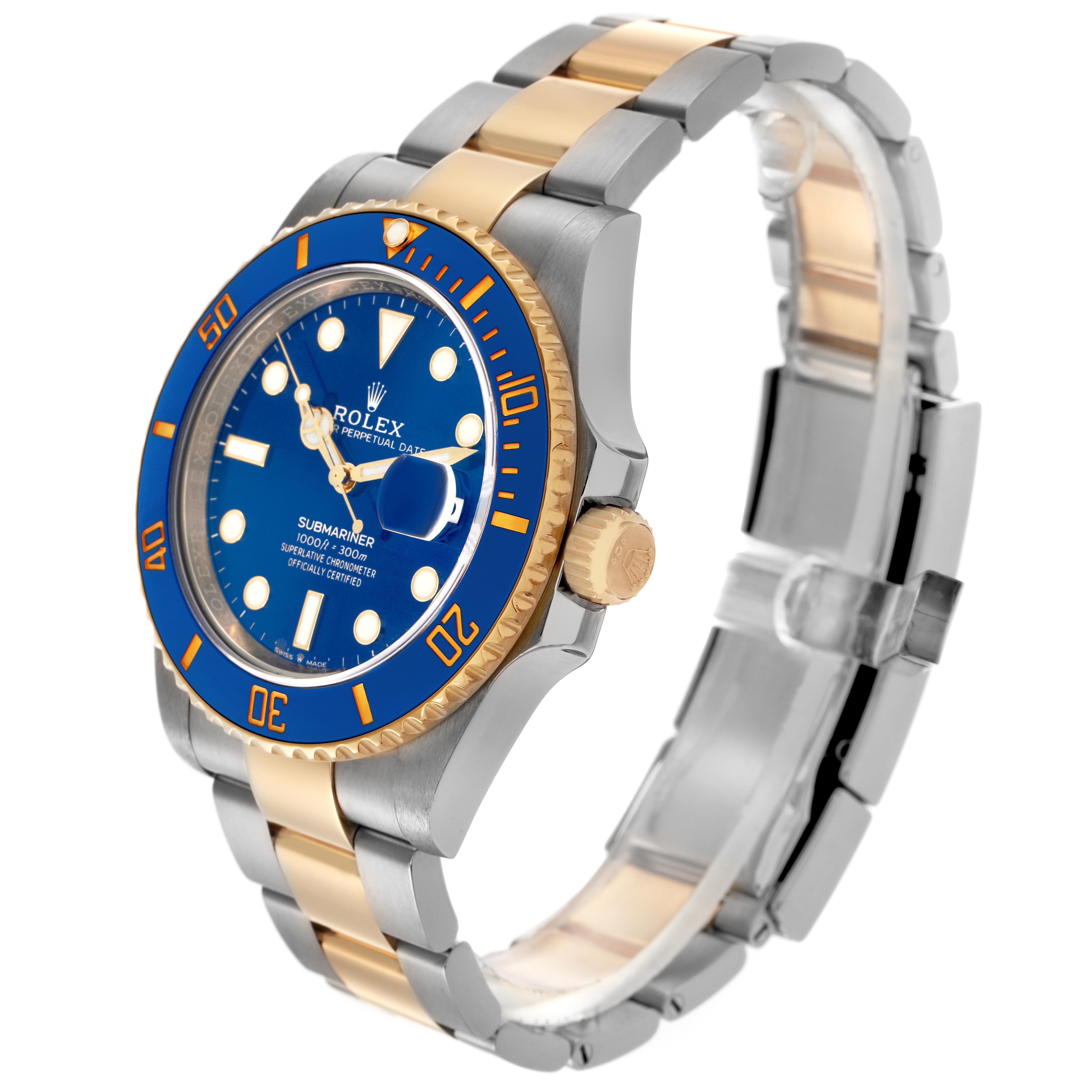 The Rolex Submariner 126613 Men
s Steel and Gold (two tone) Blue Dial 126613 Men
s Steel and Gold (two tone) Blue Dial watch is shown at a three-quarter angle, highlighting the bezel, dial, crown, and bracelet.