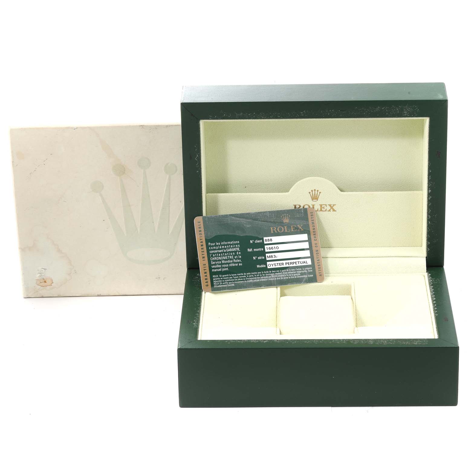 The image shows an open Rolex box for the Submariner model, with the warranty card placed inside.