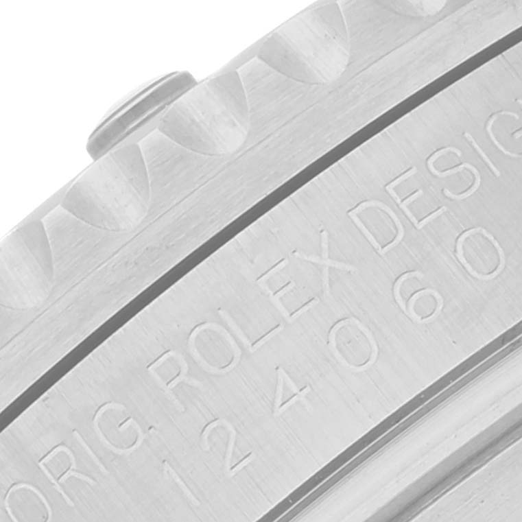 The image shows a close-up of the bezel and engravings indicating the model number 124060 of a Rolex Submariner 124060 Men
s Stainless Steel Black Dial 124060 Men
s Stainless Steel Black Dial watch.