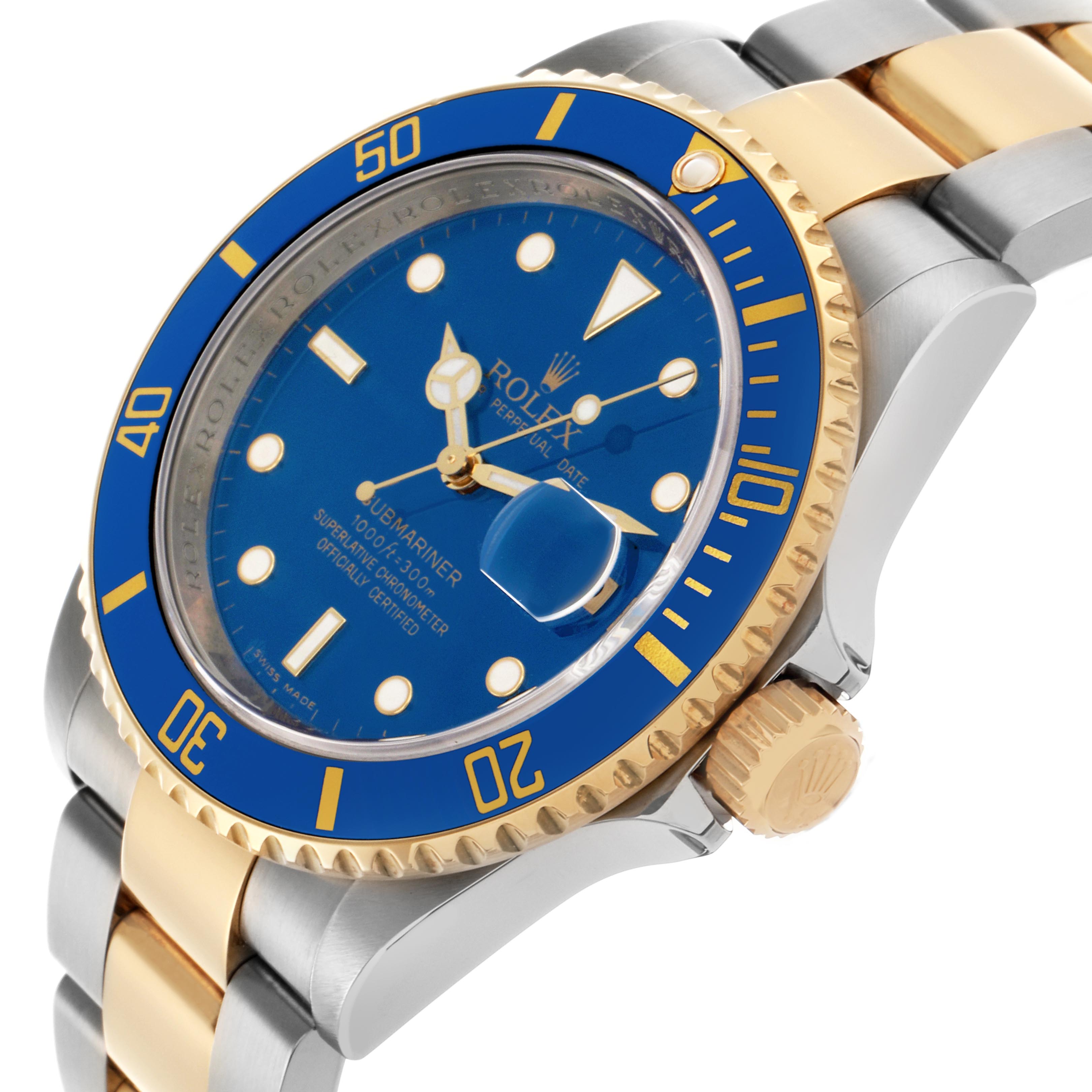 The Rolex Submariner 16613 Men
s Steel and Gold (two tone) Blue Dial 16613 Men
s Steel and Gold (two tone) Blue Dial is shown from an angled side view, highlighting the blue bezel, dial, gold crown, and two-tone bracelet.