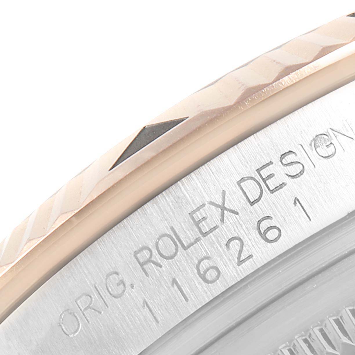 This image shows a close-up of the bezel and case back of the Rolex Turn-o-Graph 116261 Men's Steel and Gold (two tone) Black Dial 116261 Men's Steel and Gold (two tone) Black Dial watch, including the model number engraving.