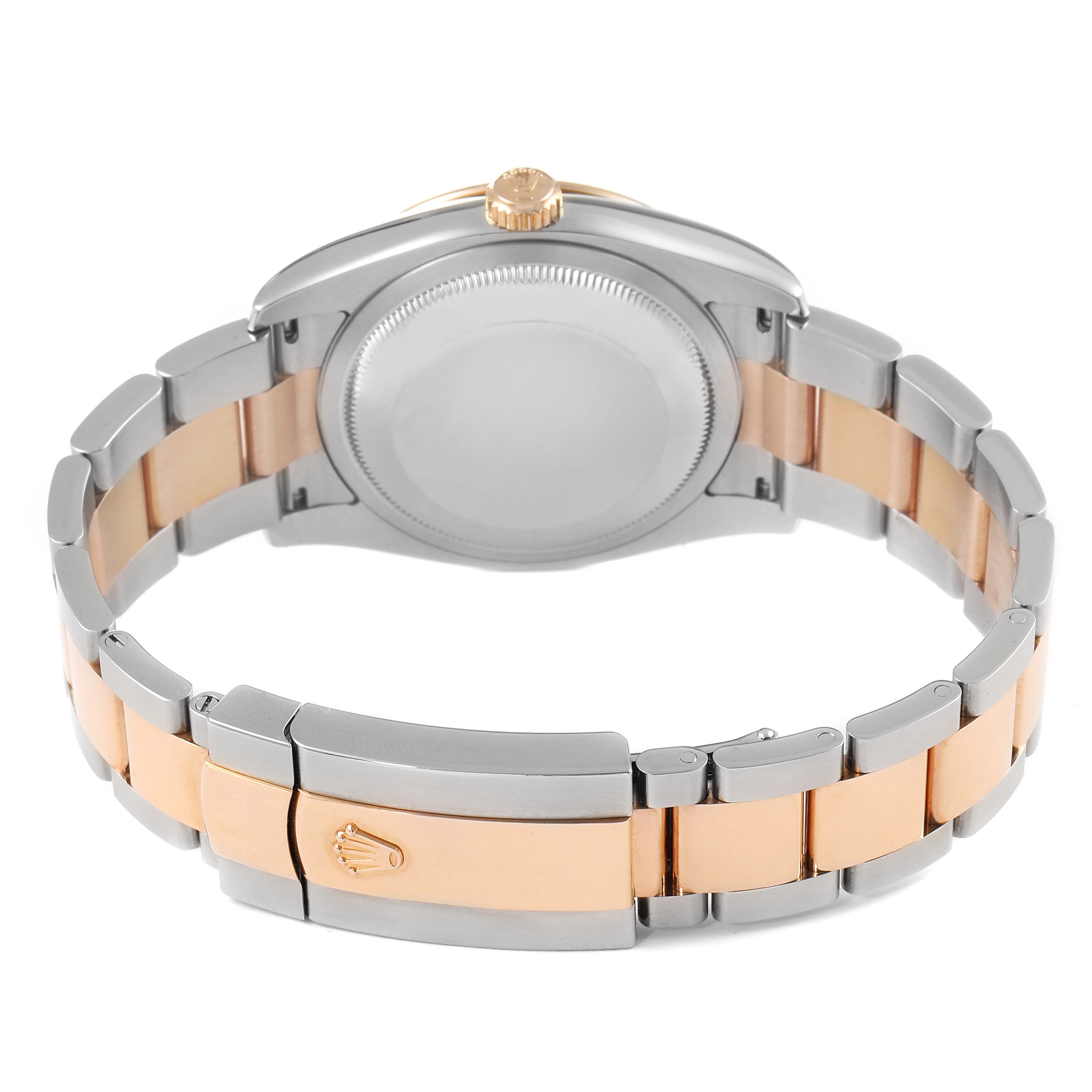 The image shows the back view of a Rolex Turn-o-Graph 116261 Men's Steel and Gold (two tone) Black Dial 116261 Men's Steel and Gold (two tone) Black Dial watch, highlighting its case back, bracelet, and clasp.