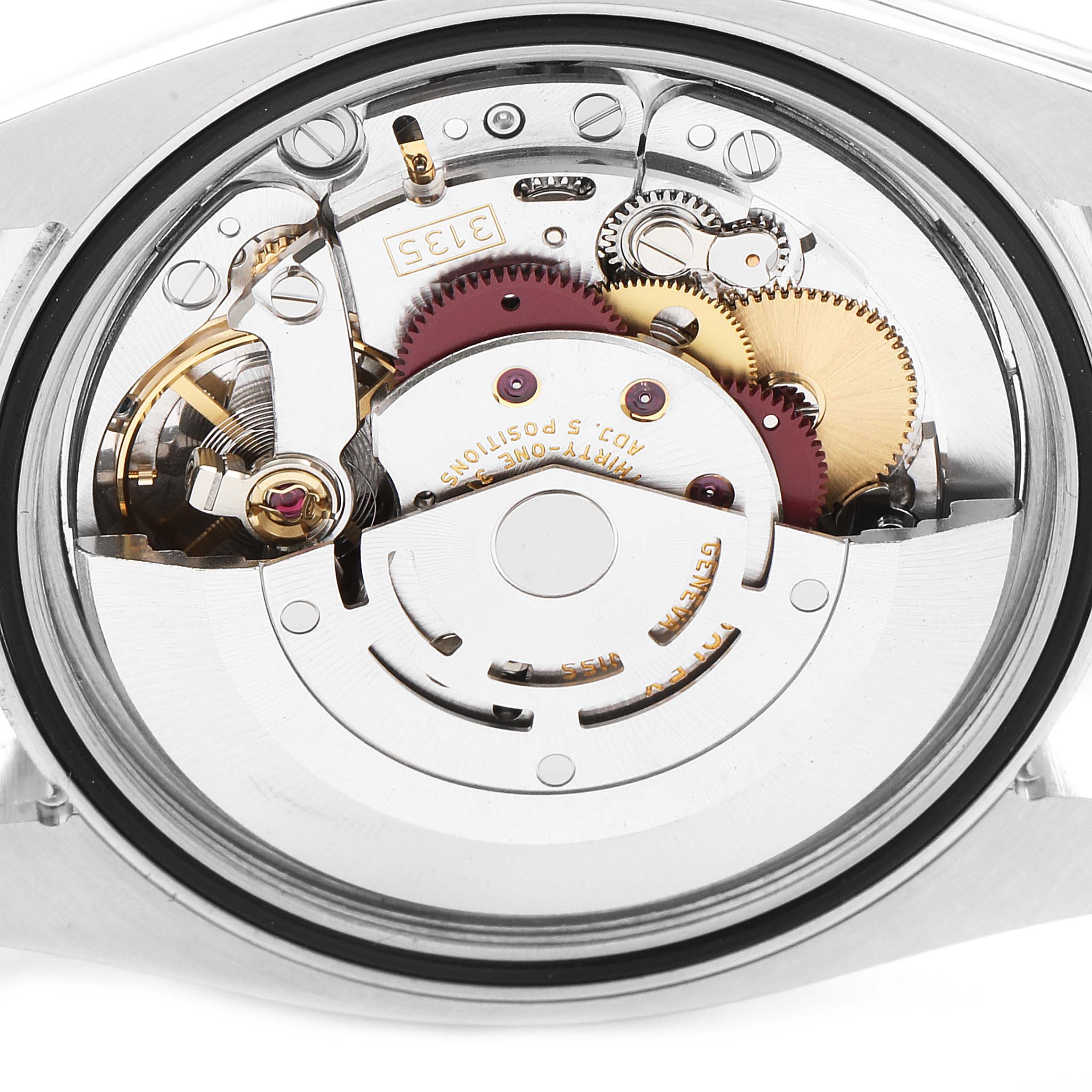 The image shows the internal mechanism of a Rolex Turn-o-Graph 116261 Men's Steel and Gold (two tone) Black Dial 116261 Men's Steel and Gold (two tone) Black Dial watch from a back angle.