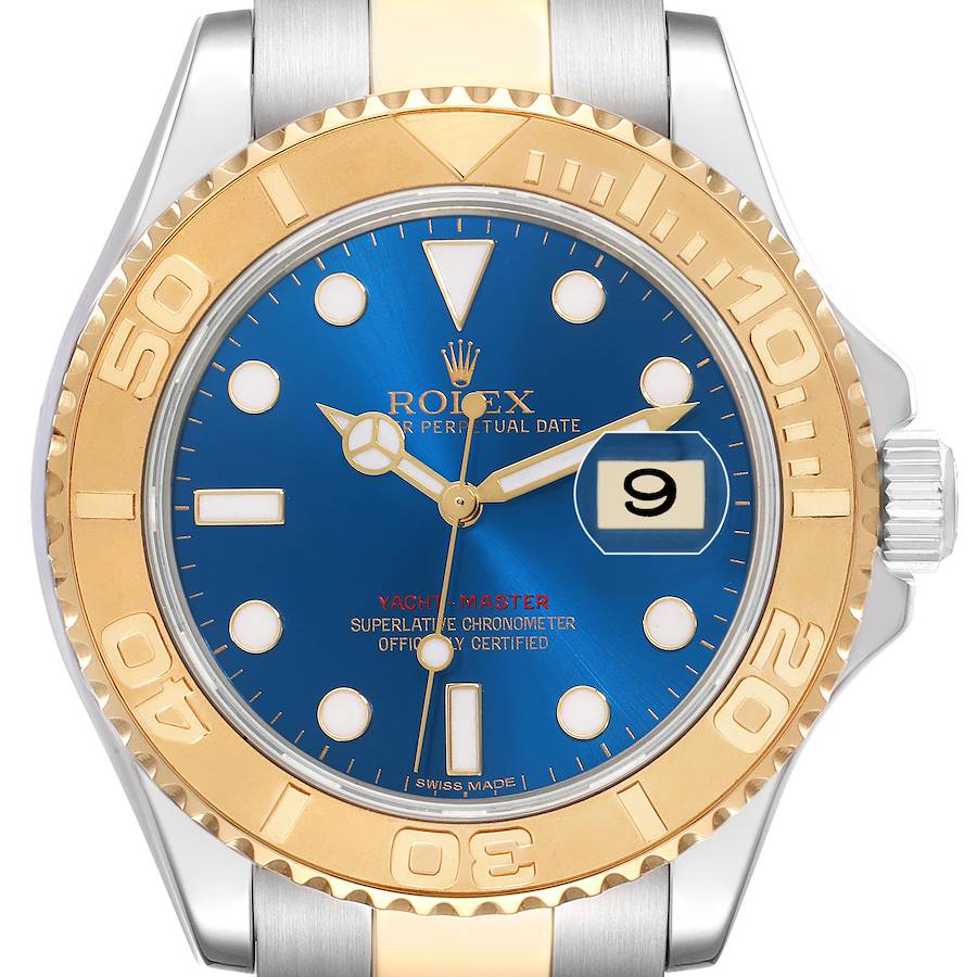 The Rolex Yacht-Master watch is shown from a front view, highlighting its blue dial, gold bezel, and metal bracelet.
