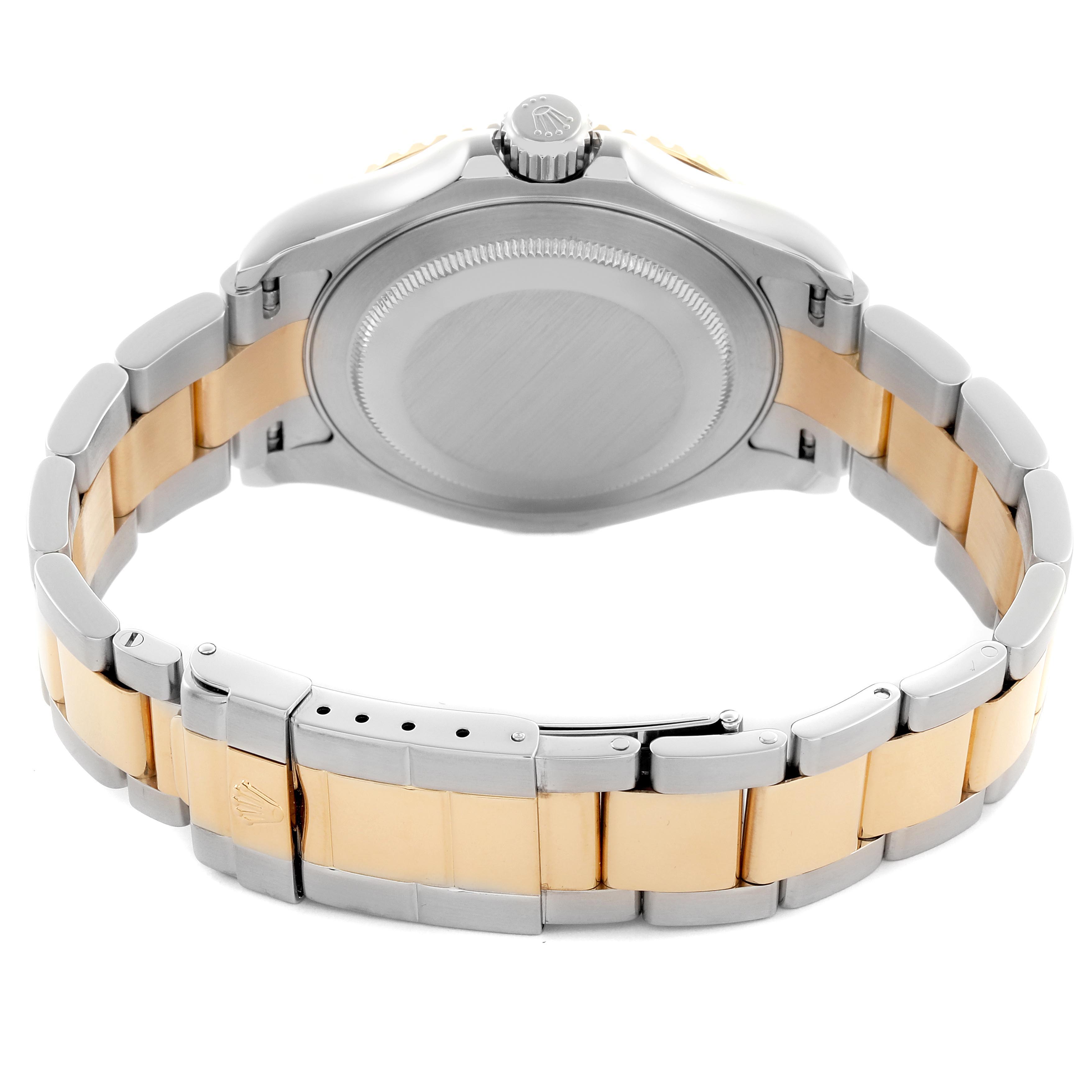 The image shows a Rolex Yacht-Master 16623 Men
s Steel and Gold (two tone) Blue Dial 16623 Men
s Steel and Gold (two tone) Blue Dial watch from the back, highlighting the case back, bracelet, and clasp.