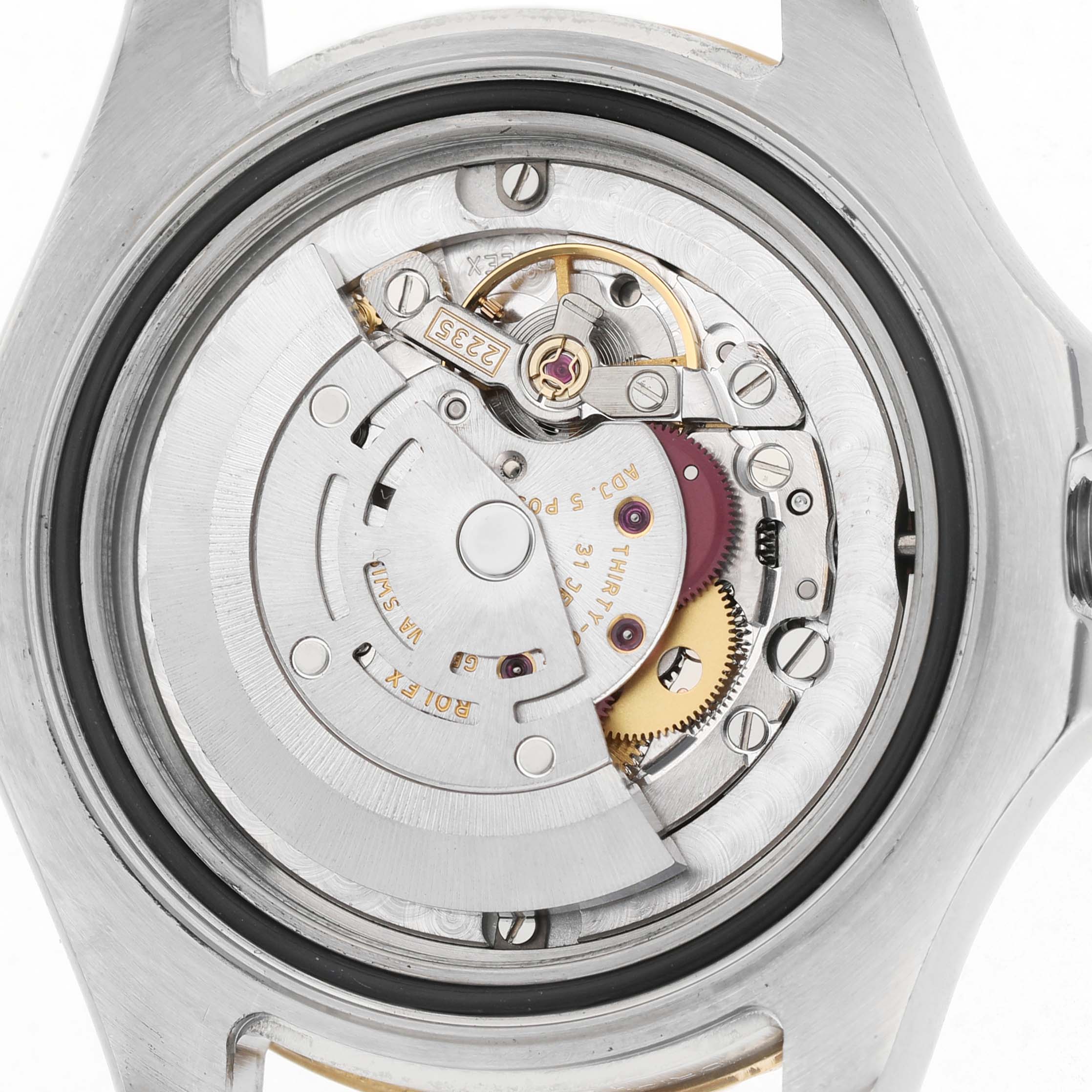 The image shows the inner movement mechanism of a Rolex Yacht-Master 168623 Men's Steel and Gold (two tone) Champagne Dial watch from the back.