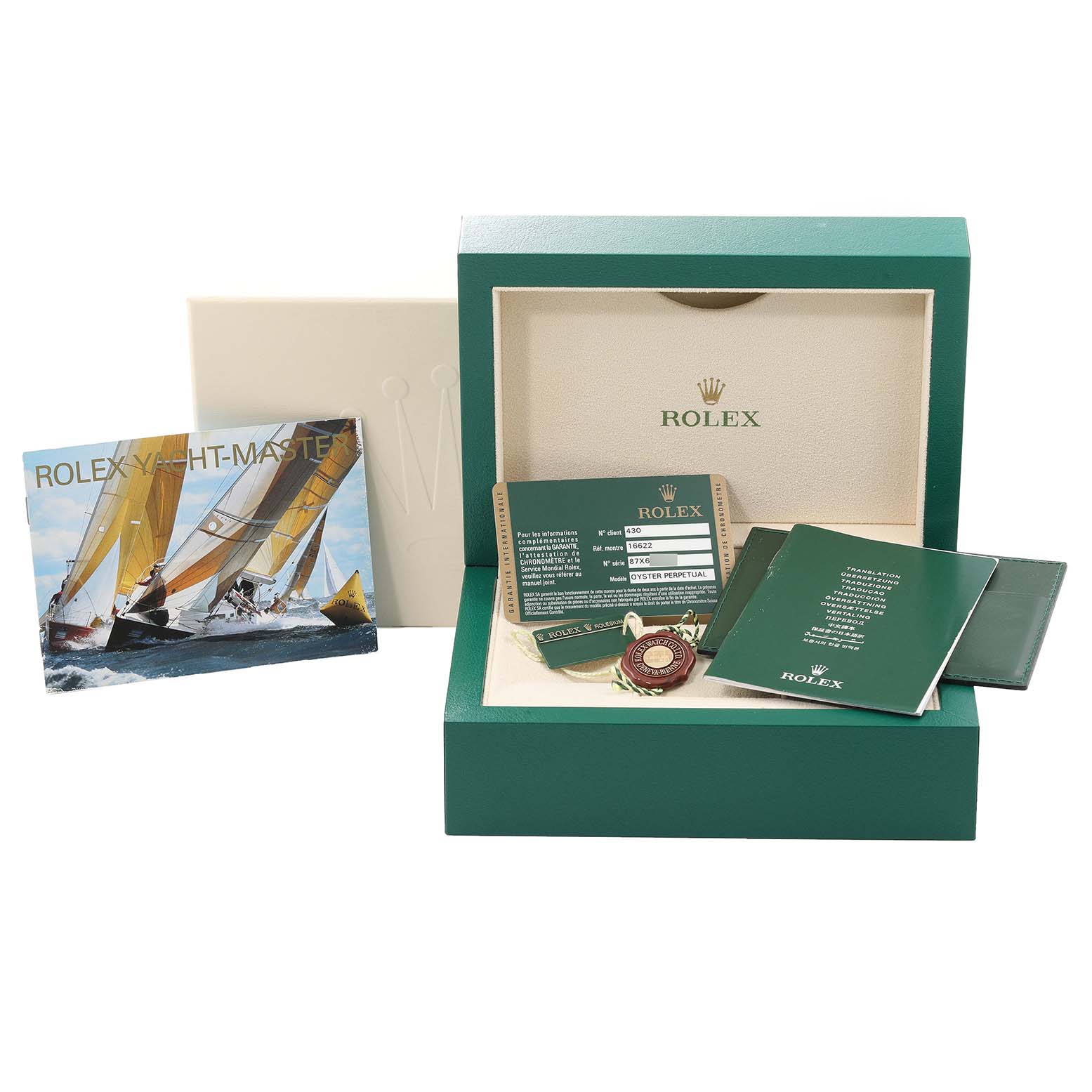 This image shows the packaging, warranty card, manuals, and accessories of a Rolex Yacht-Master 16622 Men
s Stainless Steel Silver Dial 16622 Men
s Stainless Steel Silver Dial watch.