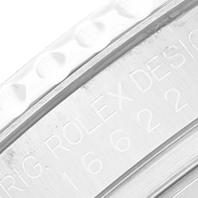 This close-up image shows the detailed engraving on the bezel of a Rolex Yacht-Master 16622 Men
s Stainless Steel Silver Dial 16622 Men
s Stainless Steel Silver Dial watch.