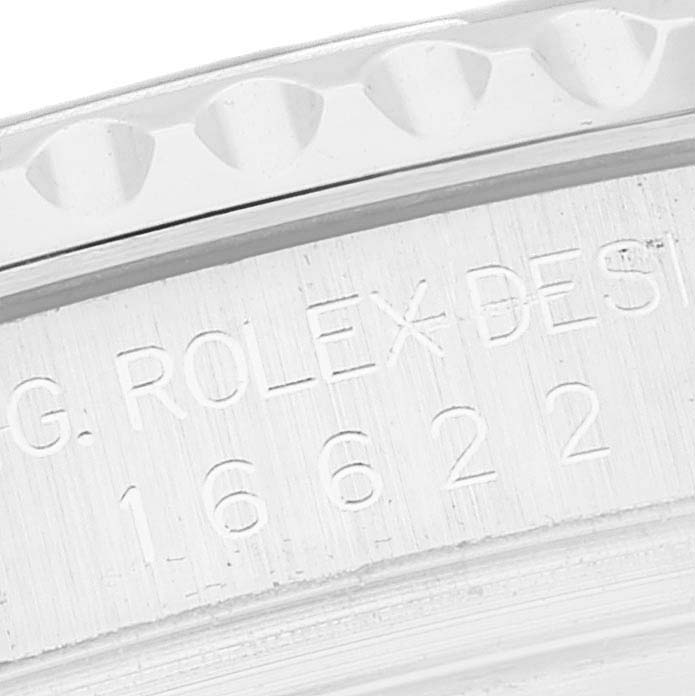 The image shows a close-up of the engraved inner bezel of a Rolex Yacht-Master 16622 Men's Stainless Steel Silver Dial 16622 Men's Stainless Steel Silver Dial watch.