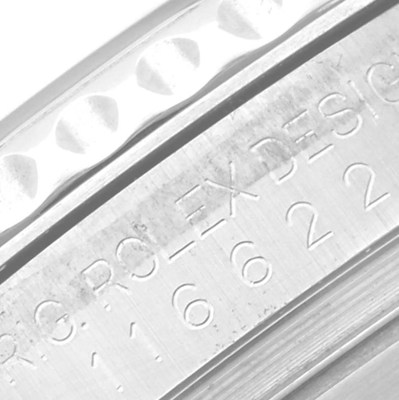 Close-up of the engraved bezel and side case of the Rolex Yacht-Master 116622 Men's Stainless Steel Grey Dial 116622 Men's Stainless Steel Grey Dial watch, showing partial text and detailing.
