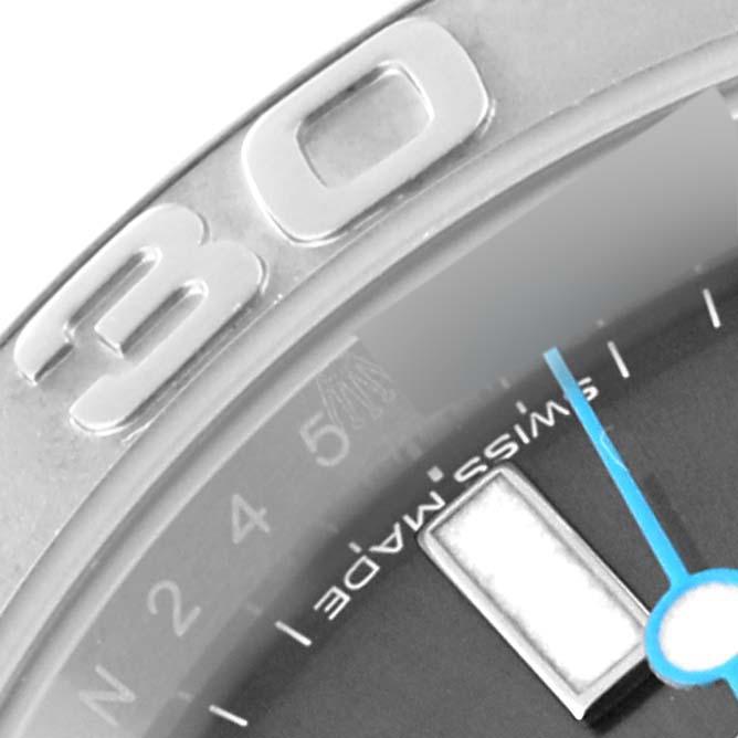 This image shows a close-up of the bezel, dial, and partially the minute hand of a Rolex Yacht-Master 116622 Men's Stainless Steel Grey Dial 116622 Men's Stainless Steel Grey Dial watch.