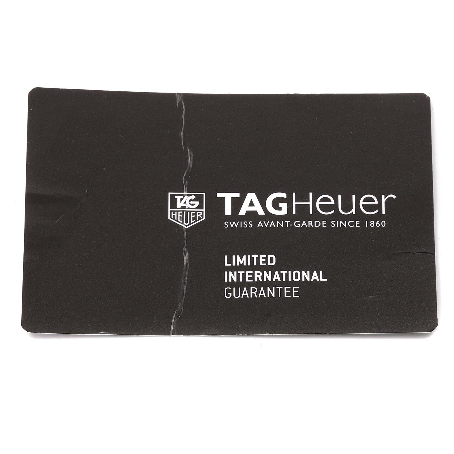 This image shows the limited international guarantee card for the Tag Heuer Carrera CV201AK Men's Stainless Steel Black Dial CV201AK Men's Stainless Steel Black Dial model.