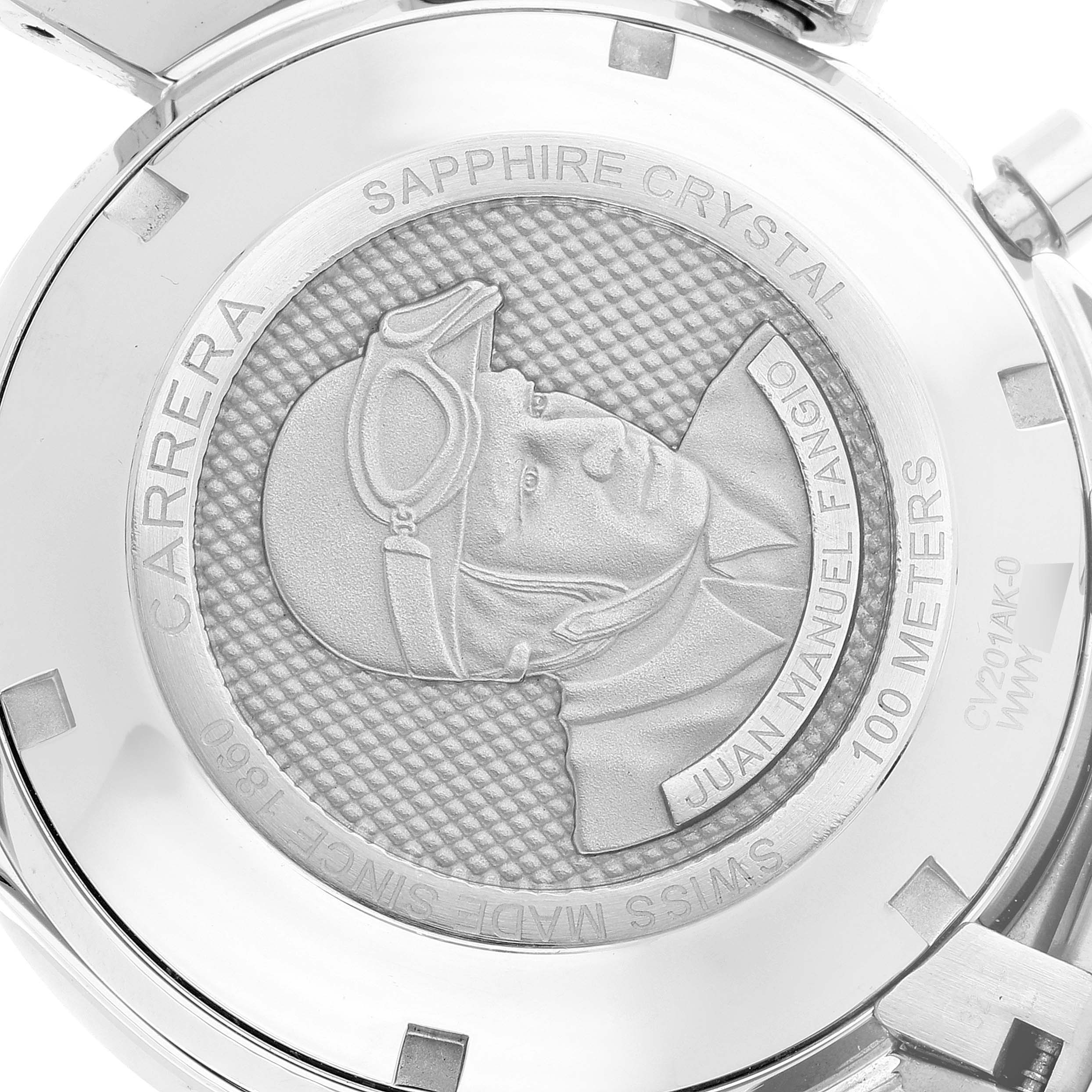 The image shows a close-up of the case back of a Tag Heuer Carrera CV201AK Men's Stainless Steel Black Dial CV201AK Men's Stainless Steel Black Dial watch, displaying the engraved logo and detailed text.