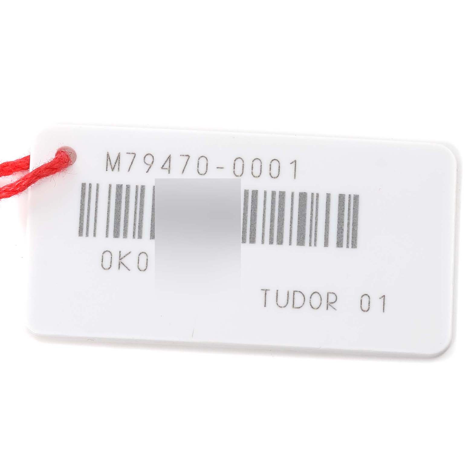 The image shows a label with the model number and branding of the Tudor Heritage Black Bay M79470-0003 Men
s Stainless Steel Black Dial M79470-0003 Men
s Stainless Steel Black Dial watch.