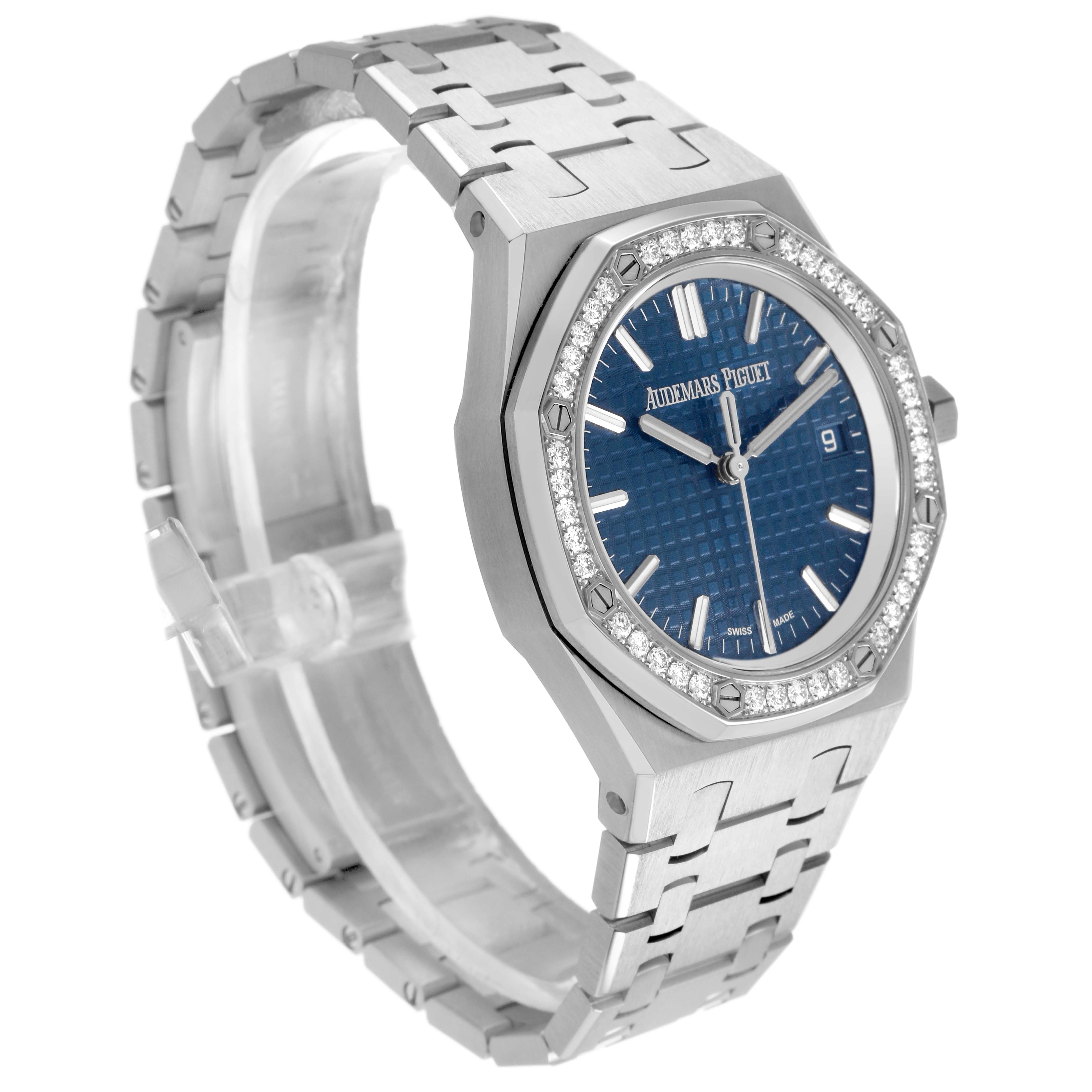 The Audemars Piguet Royal Oak 77451ST Women's Stainless Steel Blue Dial watch is shown at a three-quarter angle, highlighting its blue dial, octagonal bezel with diamonds, case, and bracelet.
