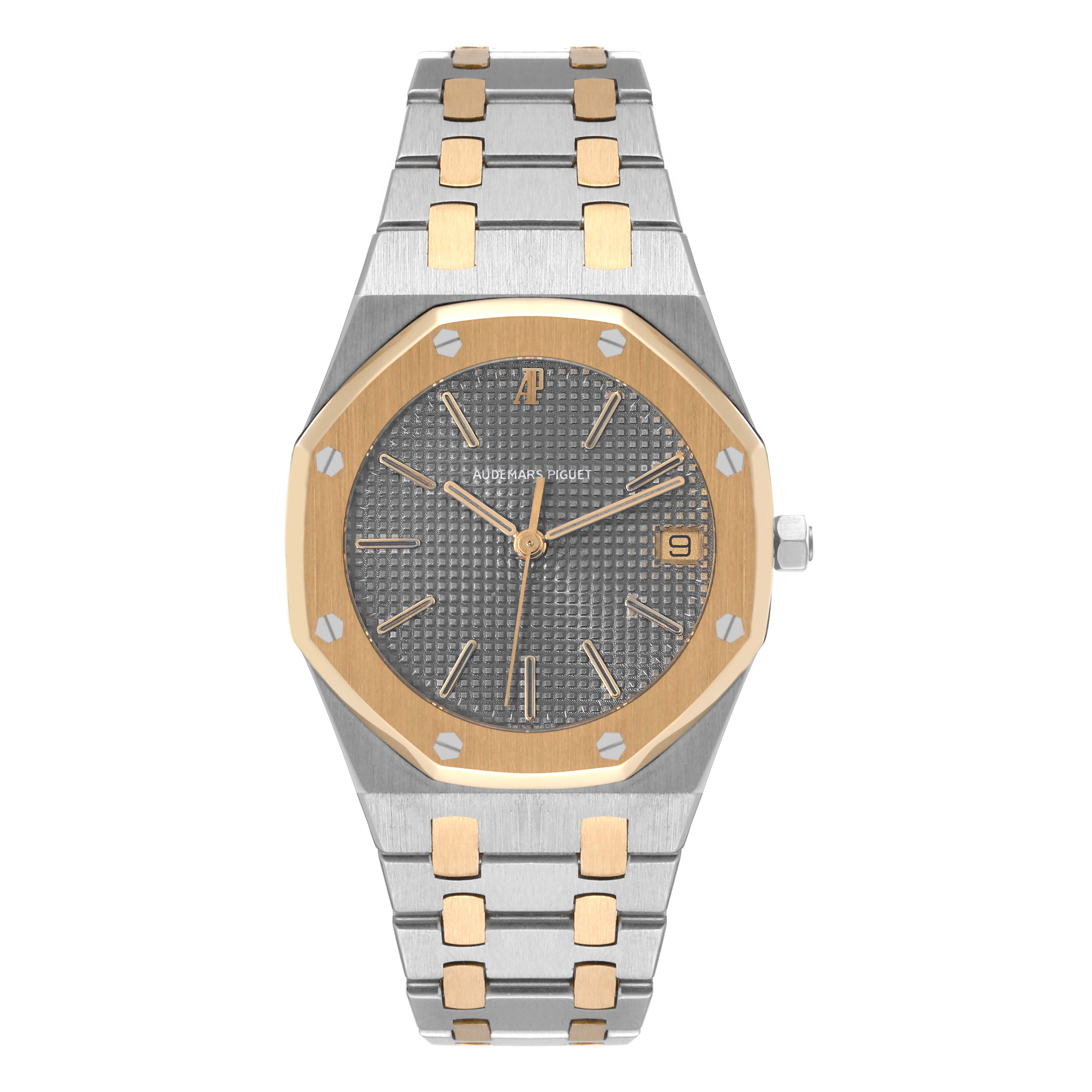 This image shows a front view of an Audemars Piguet Royal Oak 56023SA Men's Stainless Steel Grey Dial 56023SA Men's Stainless Steel Grey Dial watch featuring a two-tone bracelet and an octagonal bezel.