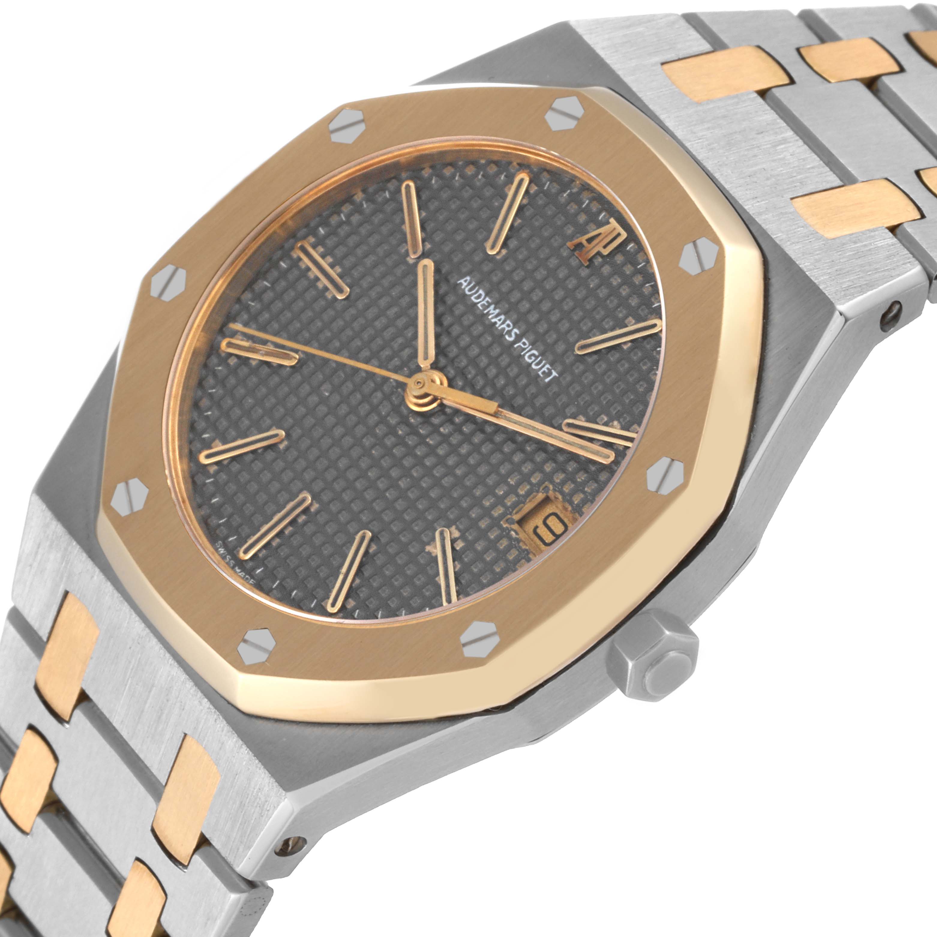 The image shows a close-up angle of the Audemars Piguet Royal Oak 56023SA Men's Stainless Steel Grey Dial 56023SA Men's Stainless Steel Grey Dial watch, highlighting the dial, bezel, hands, and part of the bracelet.