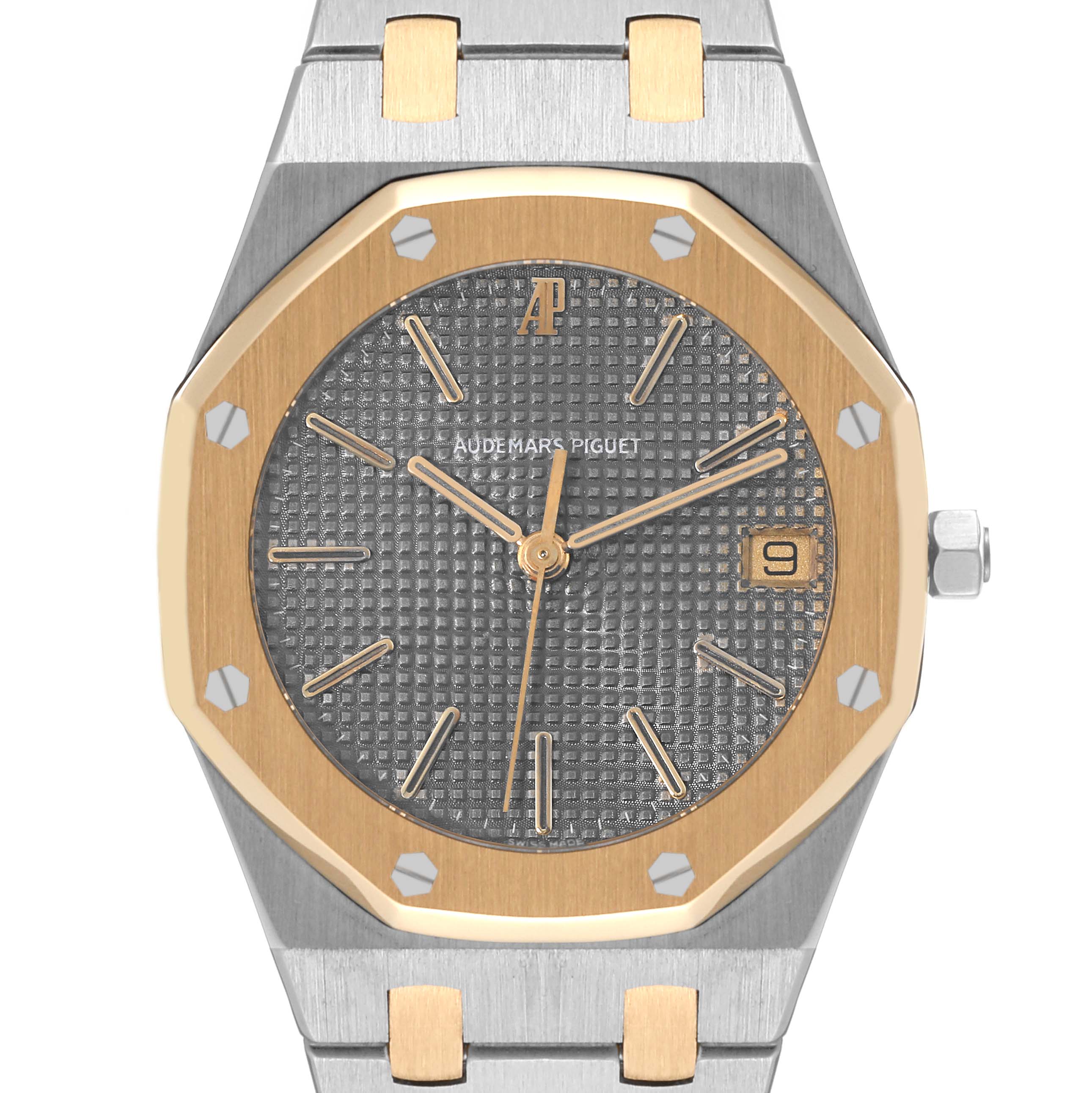 The image shows a frontal view of the Audemars Piguet Royal Oak 56023SA Men's Stainless Steel Grey Dial 56023SA Men's Stainless Steel Grey Dial watch, highlighting its dial, bezel, and a portion of the bracelet.